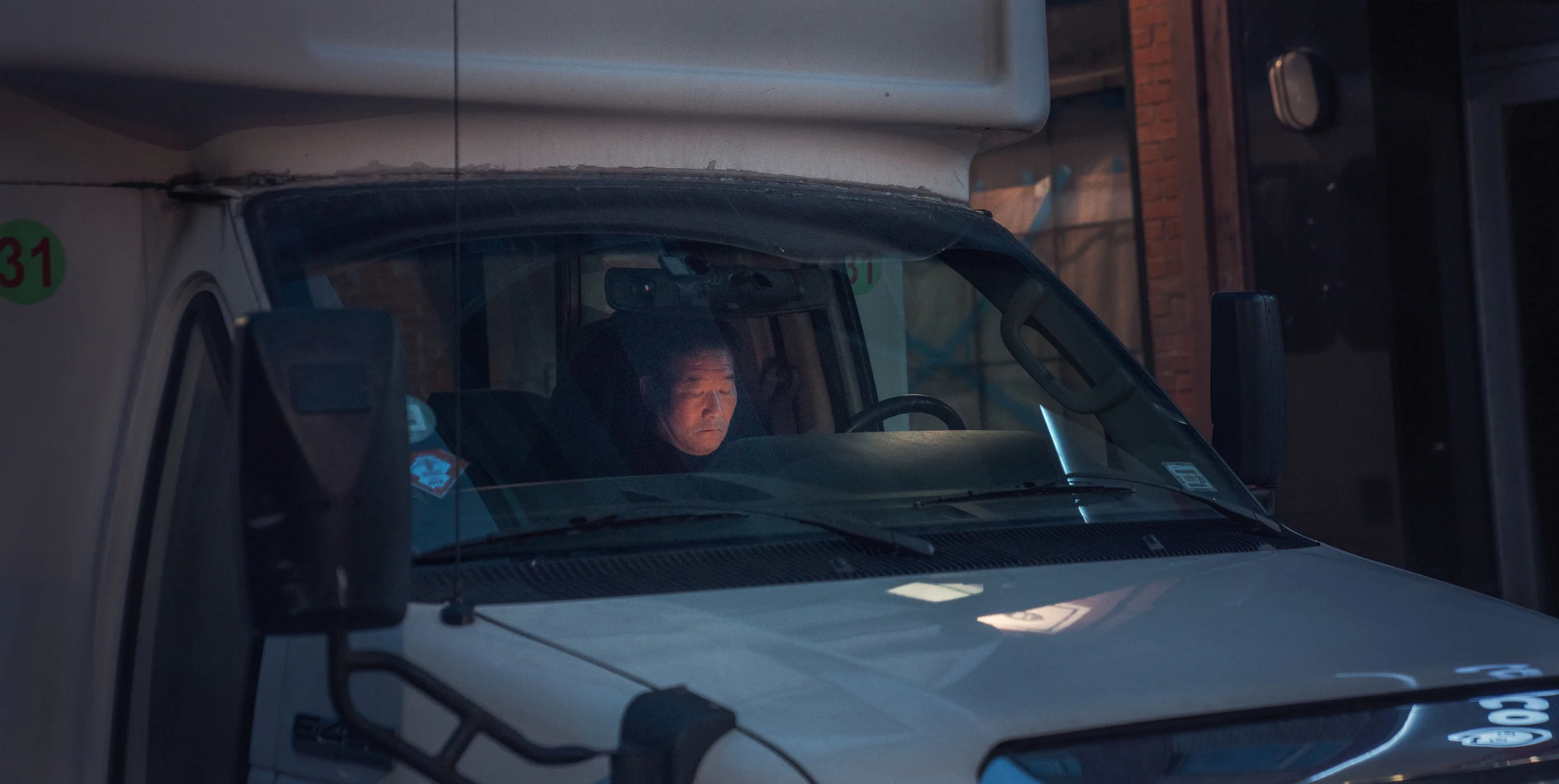 man in truck on his phone for website.jpg