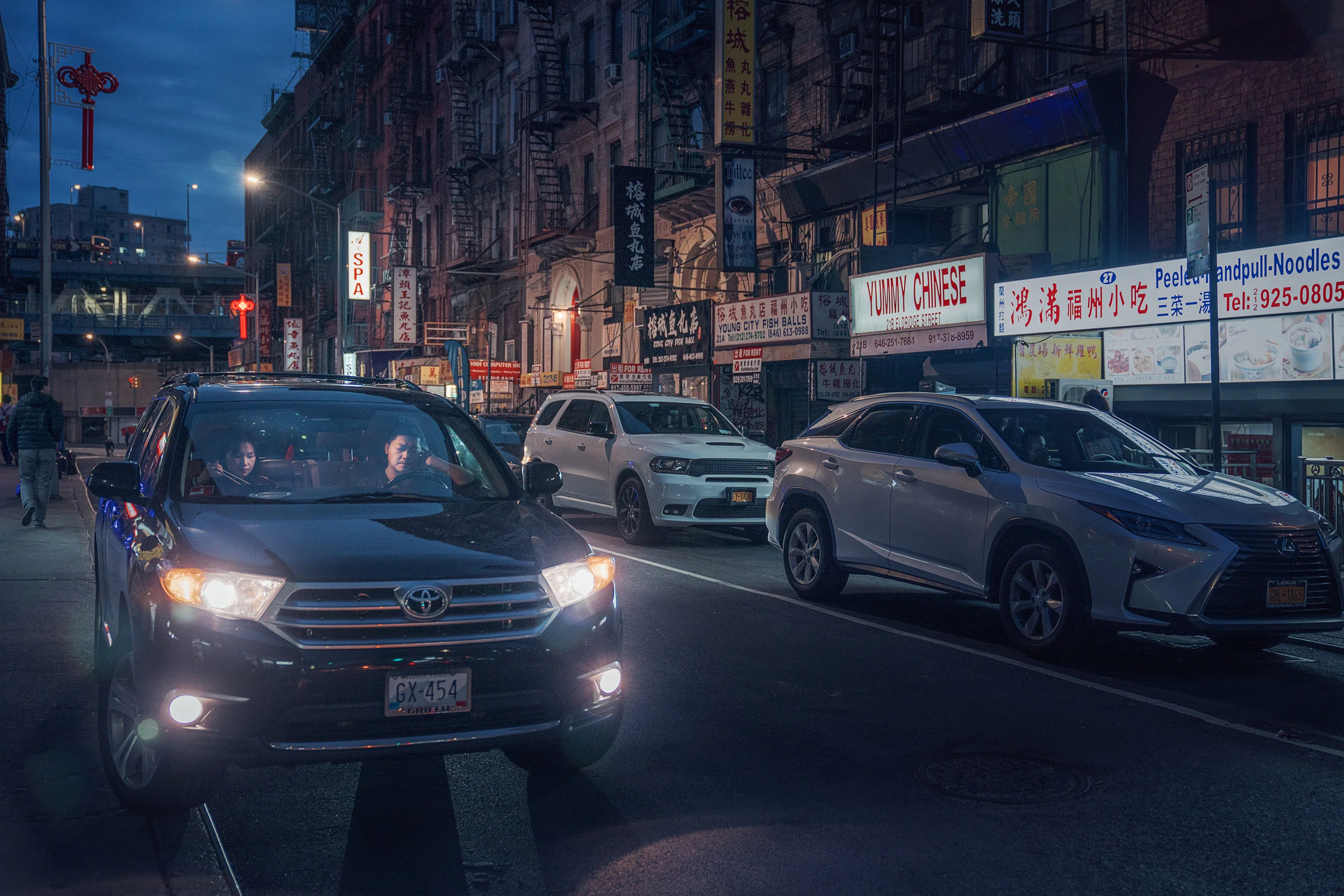 two people in car in chinatown for website.jpg