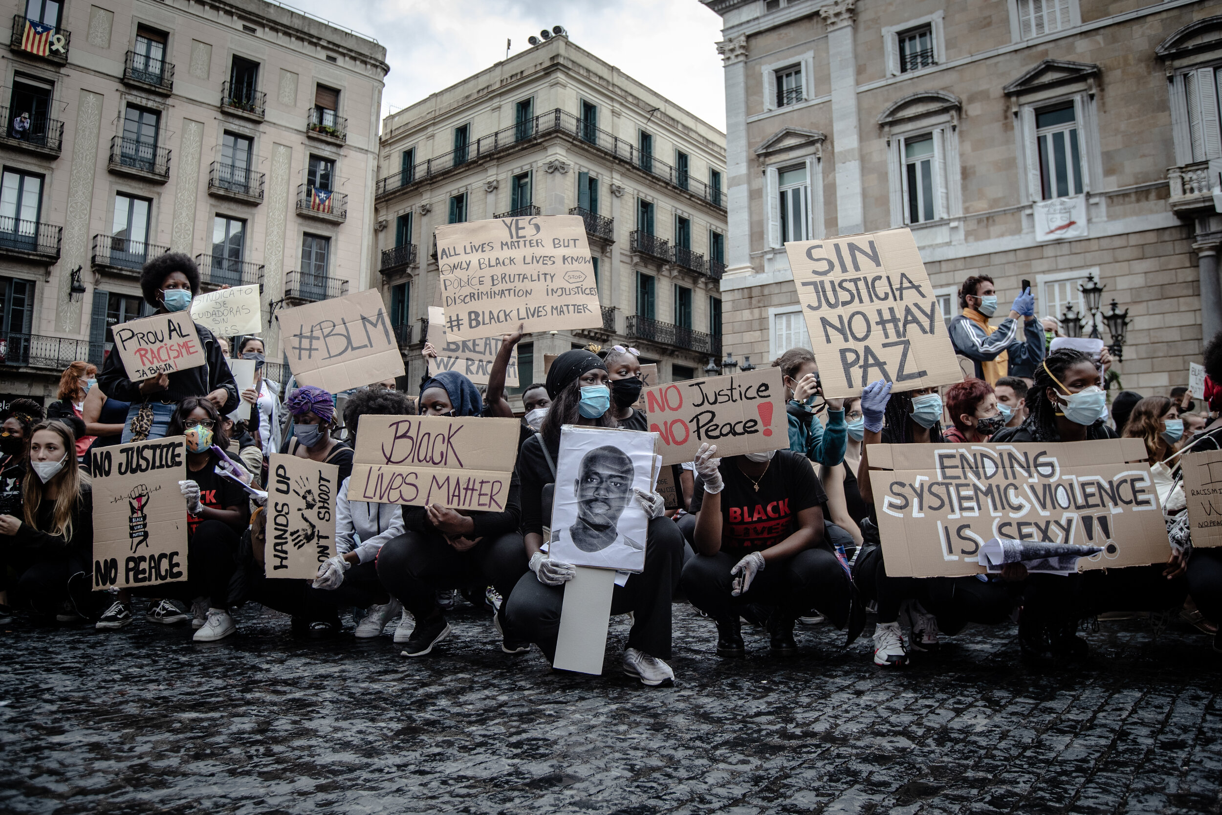  No Justice No Peace, Enough with racism, Black Lives Matter, Ending systematic violence is sexy - A peaceful protest at Plaça Sant Jaume, Barcelona, for all Black lives against racism.  Barcelona, June 7th, 2020    