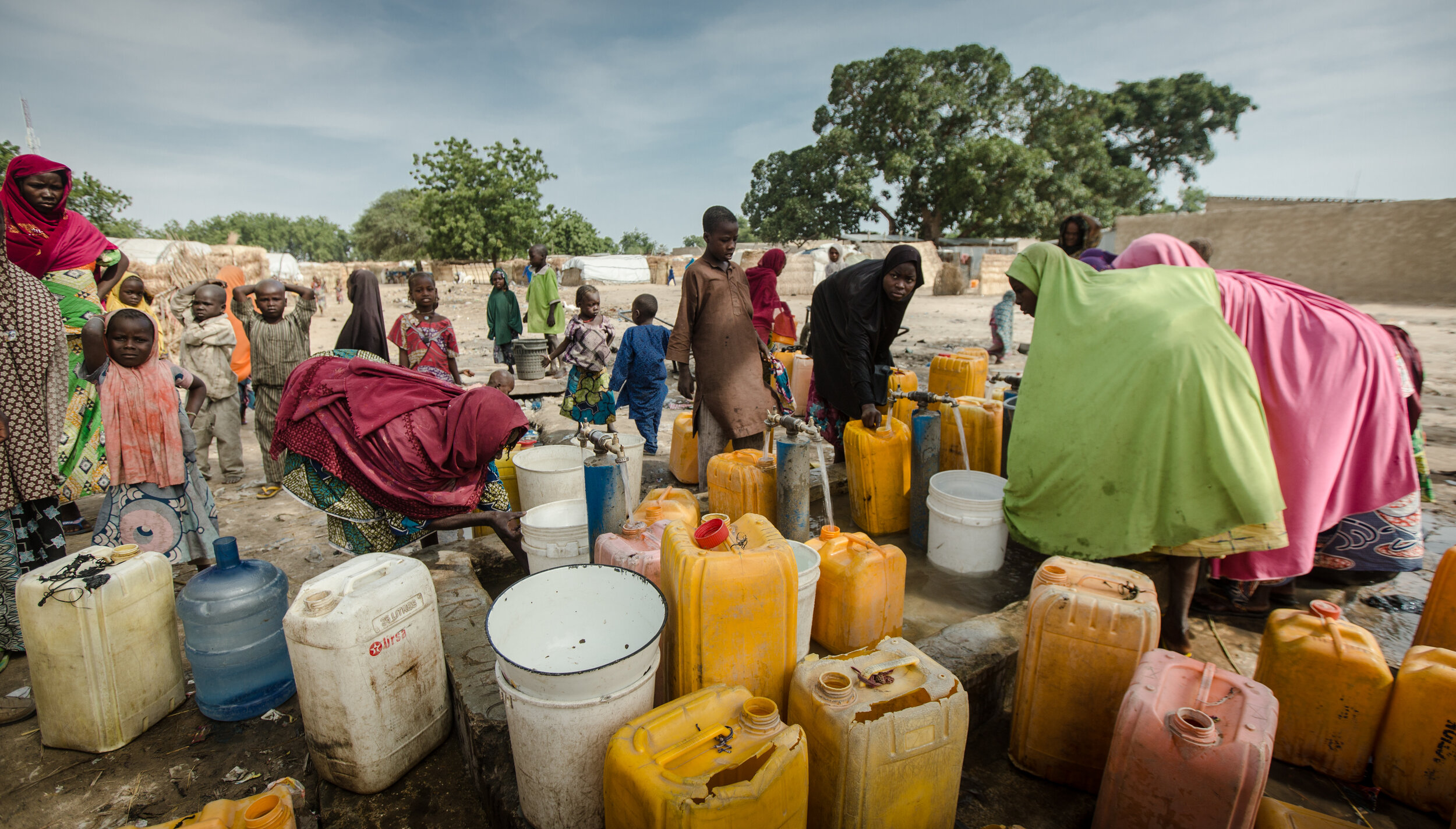  the daily morning water collection. Dalti IDP camp, Maiduguri, northeastern Nigeria. November 2018 