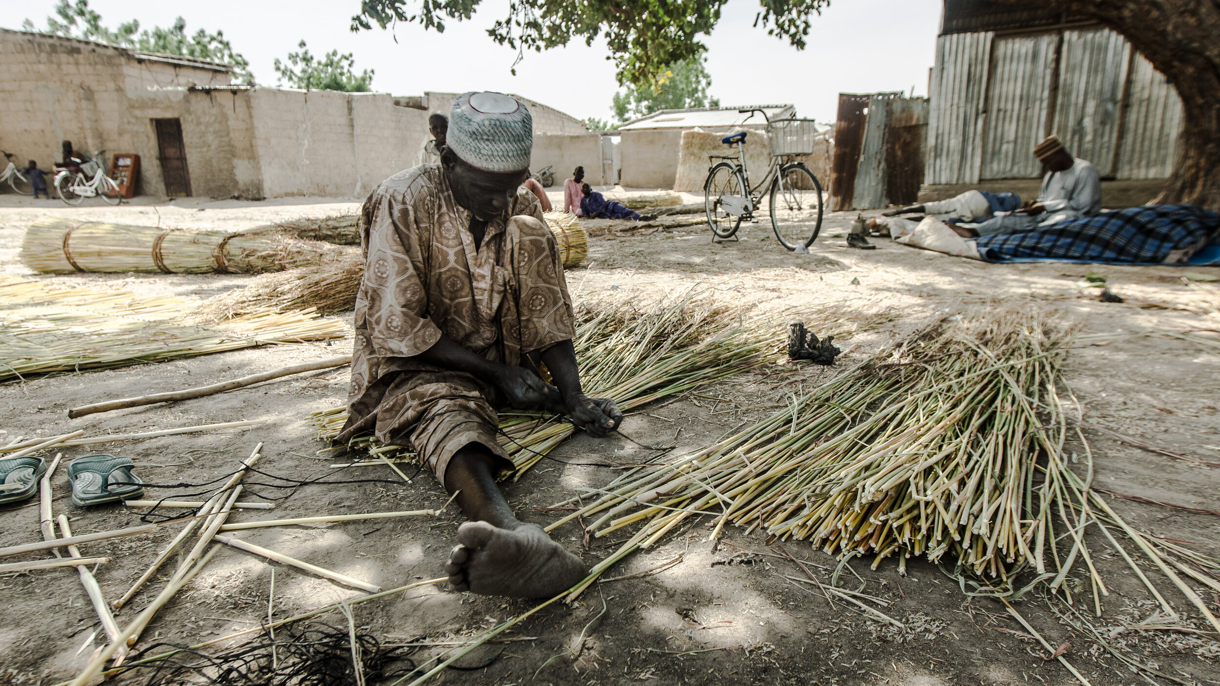  in Maiduguri’s Dalti settlement camps the main source of income is carpet making. depending on the design, some carpets take up to 3 weeks to be completed, they are then taken to be sold in town. food supplies are provided only by donations with qua