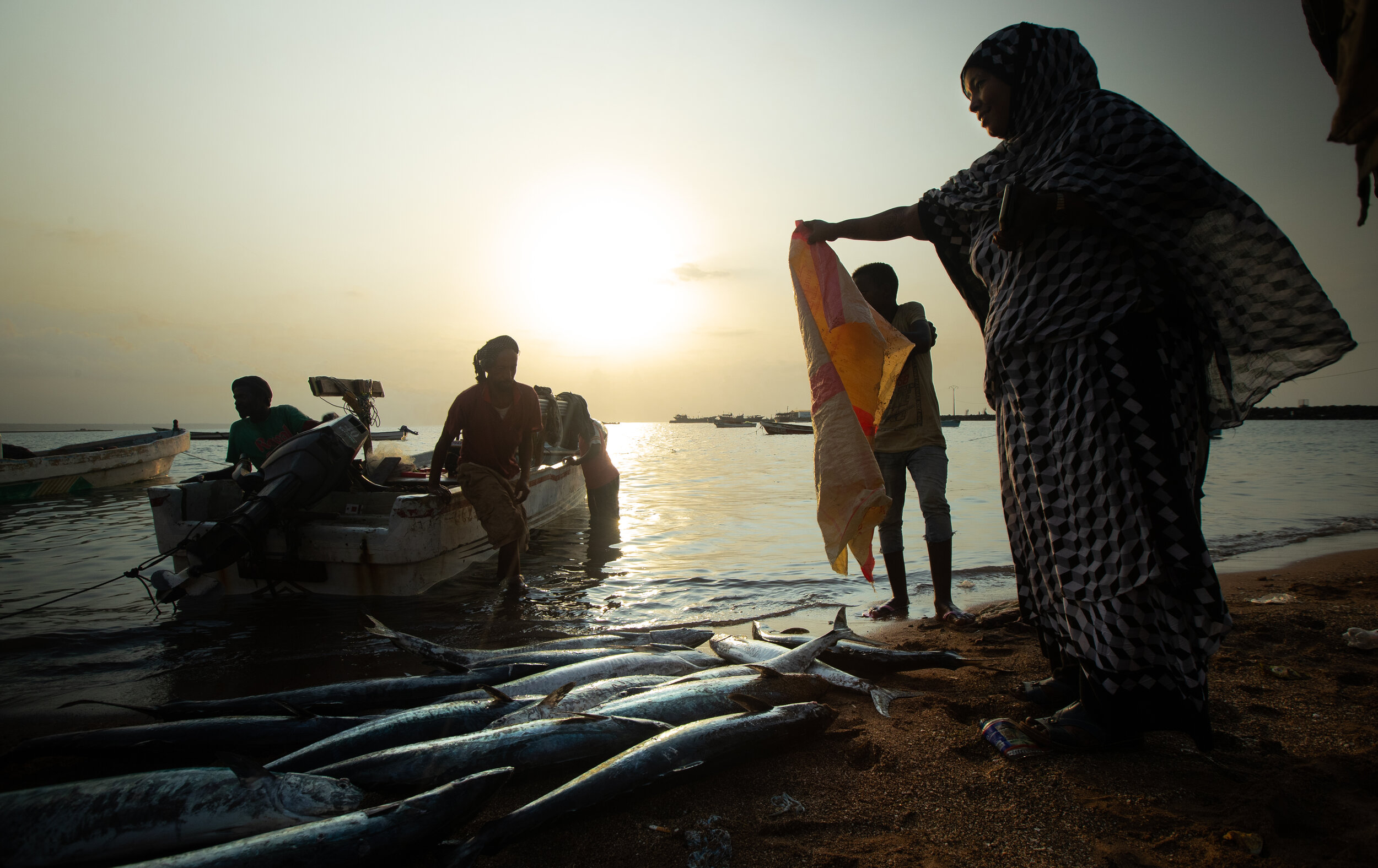  the fishermen of Obock show Aisha, their leader, their respect while she preserves her grandfather’s legacy. Obock, Djibouti, 2019 