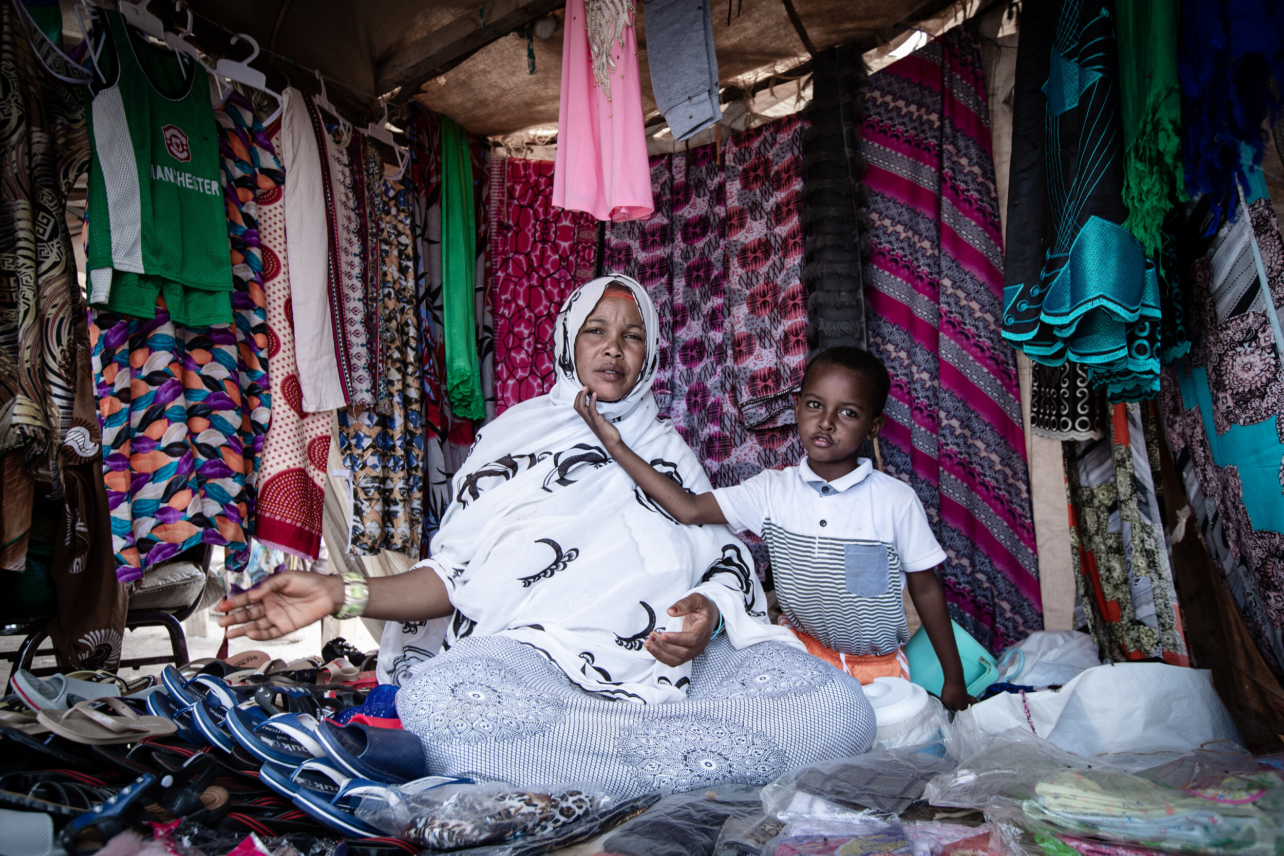  at a textile street shop in Damerjog IDP camp in Djibouti, which holds several IDP camps for the internally displaced communities. those in search for work opportunities in the city or having to leave their homes due to the damages caused by frequen