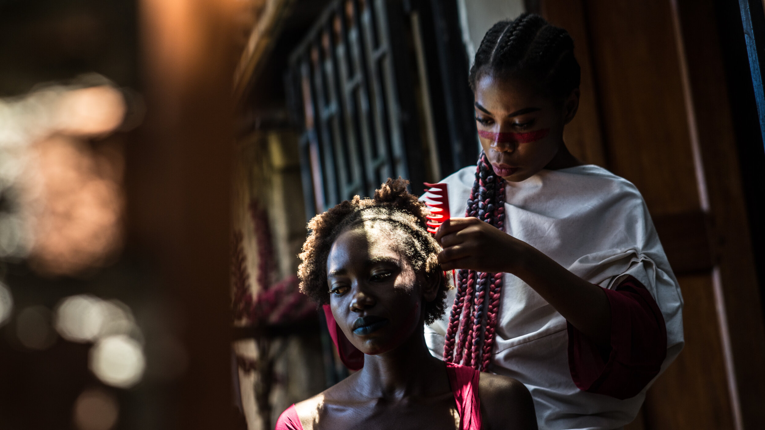  Marite working her magic on Immy’s hair for the Salooni project shoot. Kampala, Uganda, 2017 