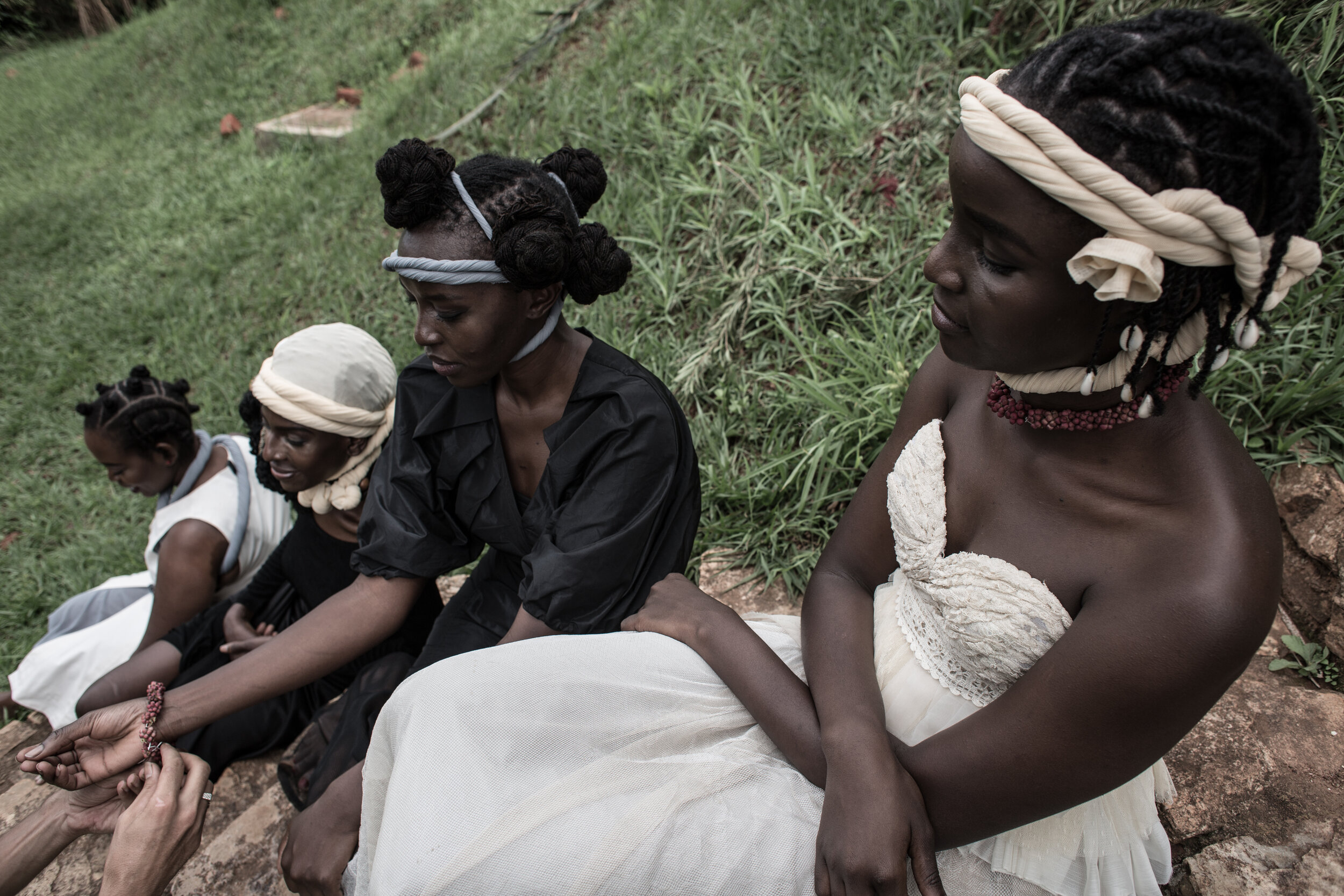  Teesa in foreground posing for Darlyne during the Salooni shoot. Kampala, Uganda, 2017 