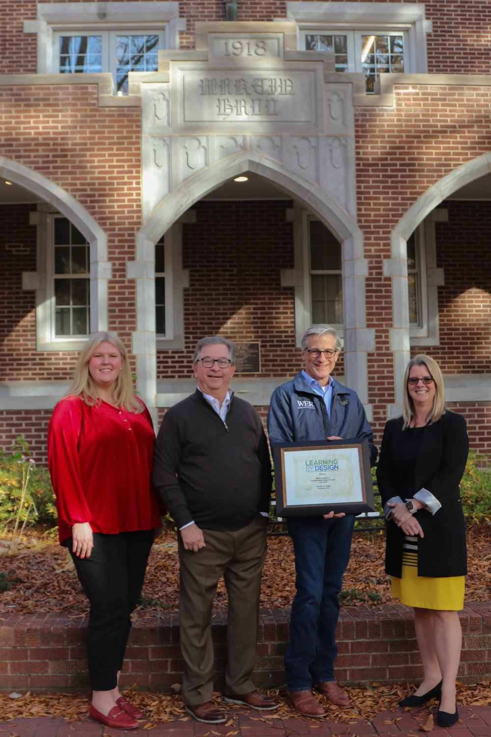  Leaders from Hendrix College and WER Architects gathered on December 12 to mark the honors that last year’s residence hall renovation projects have received. From left: Greer Veon, Hendrix College Director of Residential Life; Ellis Arnold, Presiden