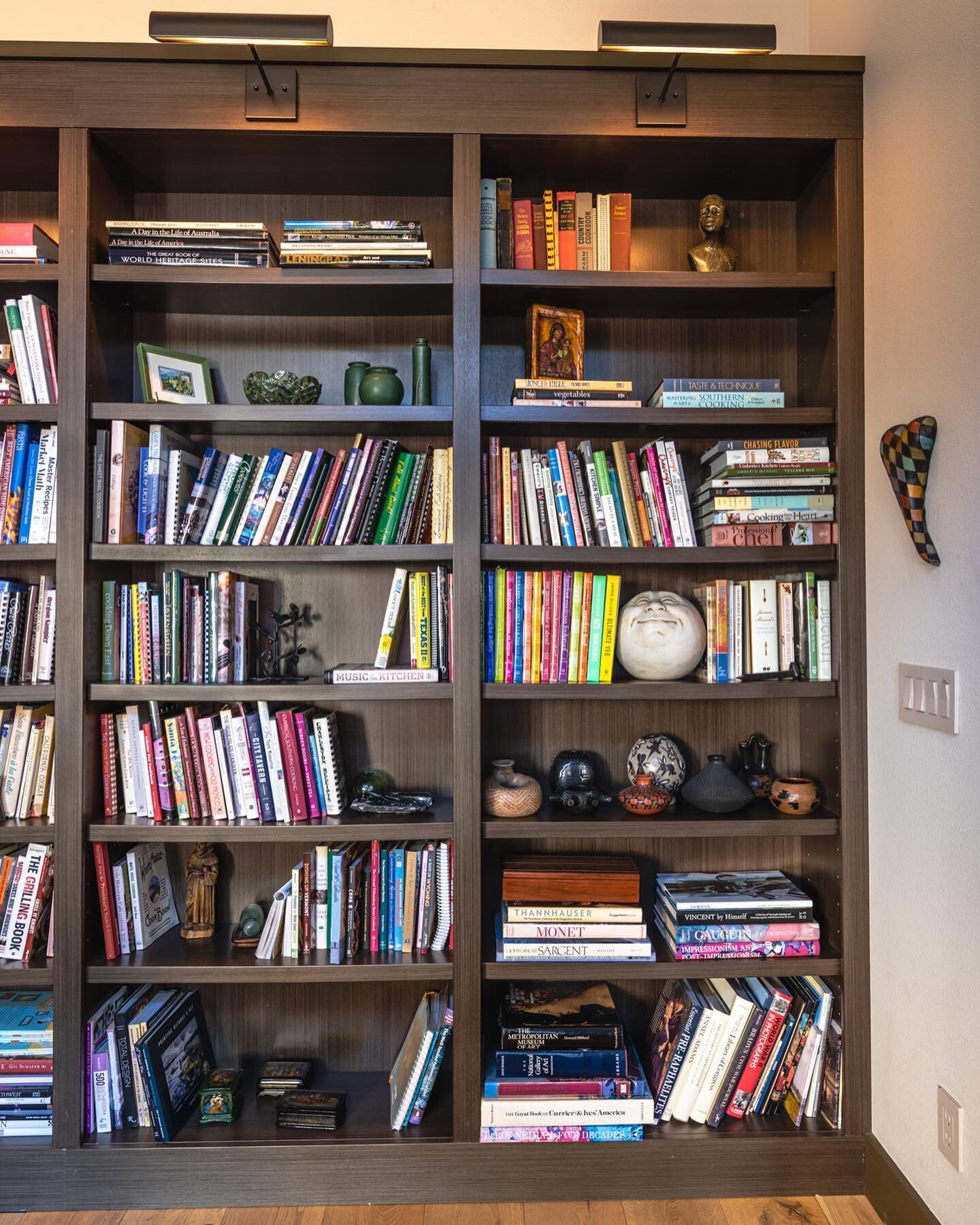 &ldquo;My father always says, to know a man, you must visit his library, for the contours of his mind have been shaped by the words on his bookshelf&rdquo;― Rehan Khan 

And his art!
#customcabinetry #bookshelves #art #library #pacificdesigninc