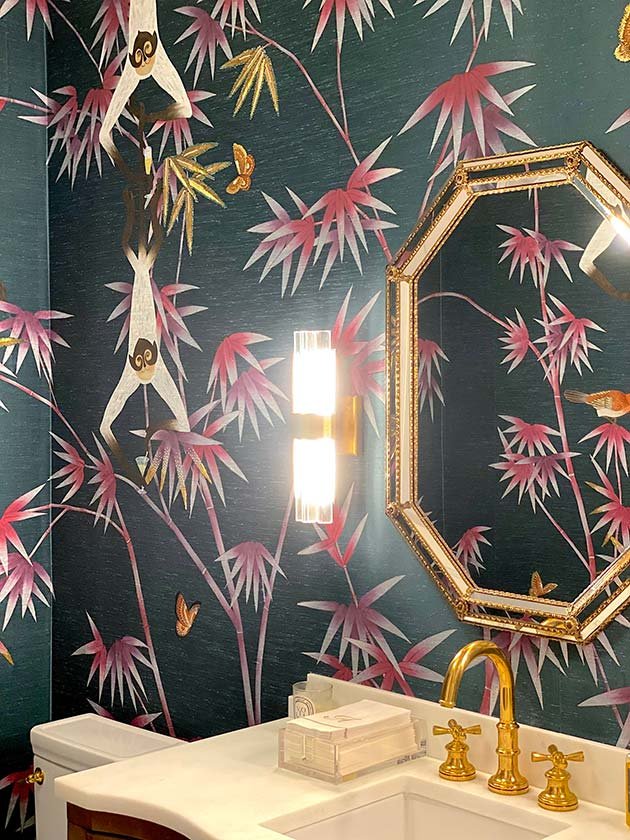  Luxurious bamboo jungle wallpaper with hand-painted mischievous monkeys, light blue walls, and chic black and gray accents, crafted for sophisticated spaces. 