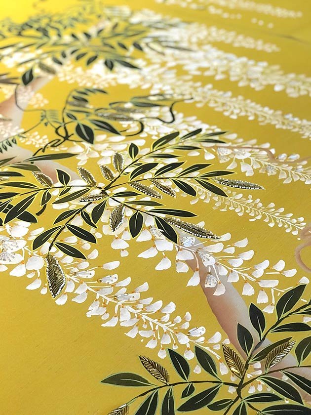  Designer Wisteria Palace Wallpaper: Exquisite close-up of white and green flowers on Thai silk, embodying the essence of luxury interior decoration. 