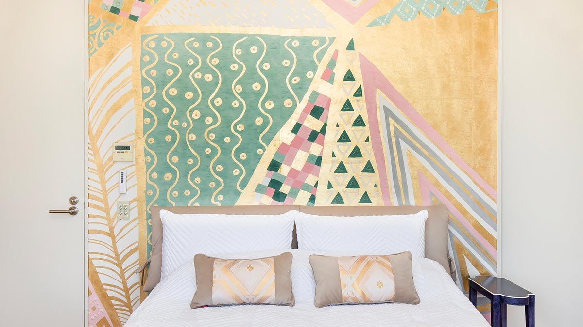  Colorful Pizza Puzzles Hand-Painted Wallpaper: A vibrant bedroom mural with a blend of green, yellow, orange, and pink, perfect for a designer home. 