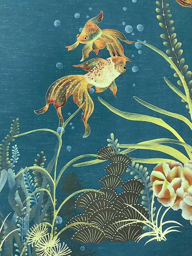  Captivating Goldfish Dream Wallpaper: Orange goldfish in a deep blue ocean with colorful coral reef, embodying the essence of luxury and designer oceanic decor. 