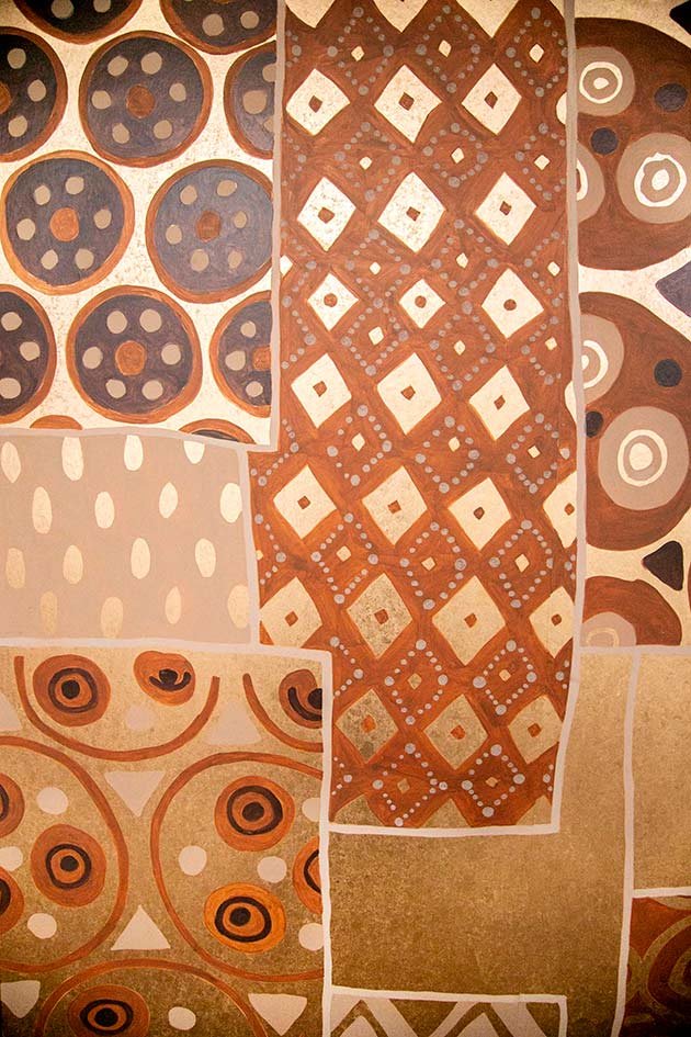  Hand-Painted Aboriginal Patchwork Wallpaper for Luxury Designers: Dynamic patterns that serve as an inspiring tribute to indigenous craft, complementing sophisticated interior decor. 