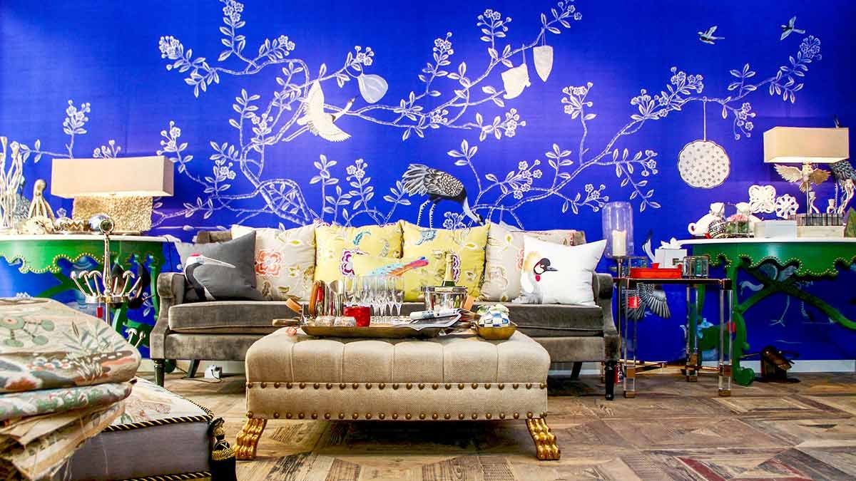  Luxury interior designers' choice: Imperial Curiosities blue Chinoiserie wallpaper with hand-painted playful cranes on a wall section, ideal for sophisticated decor. 