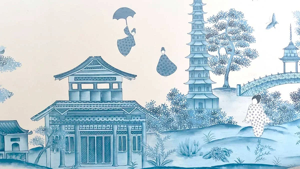  Close-up view of Chinoiserie Village wallpaper depicting a blue and white pagoda and bridge on a Chinese landscape, perfect for luxury and oriental interior designs. 