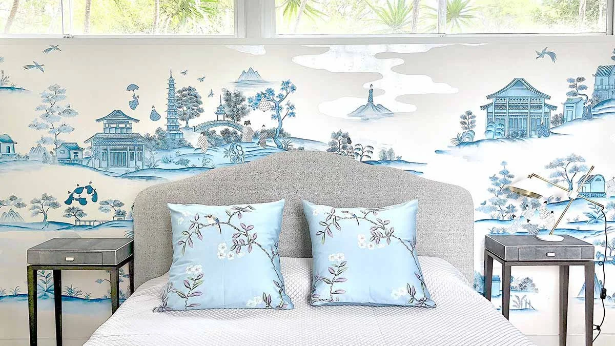 Floral design wallpaper in brown, blue, and white from Chinoiserie Village, creating a whimsical and serene atmosphere in bedrooms, designed by luxury interior designers. 
