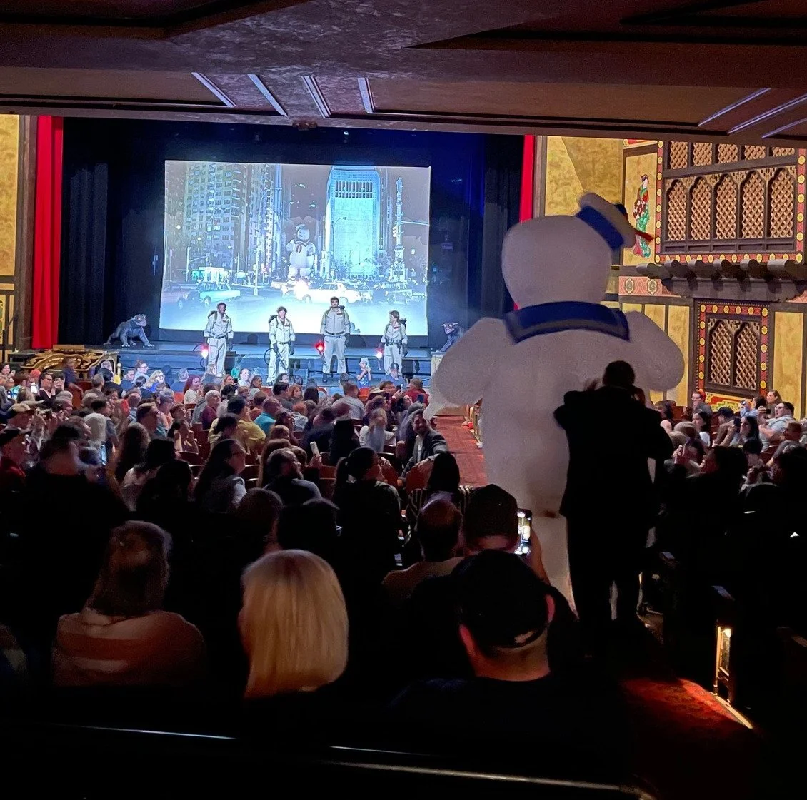 The Ghostbusters facing down The Marshmallow Man