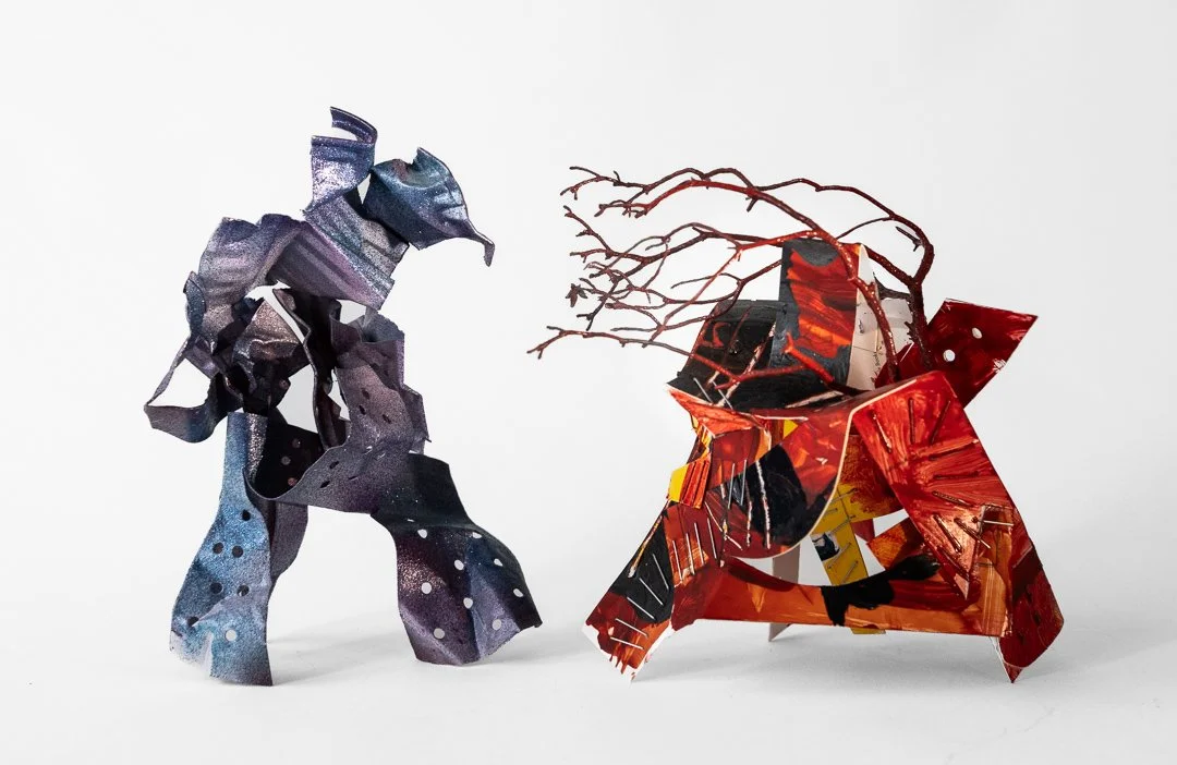 Two Samurai, abstract sculptures by Donnelly Marks made from metal, paper, and twigs