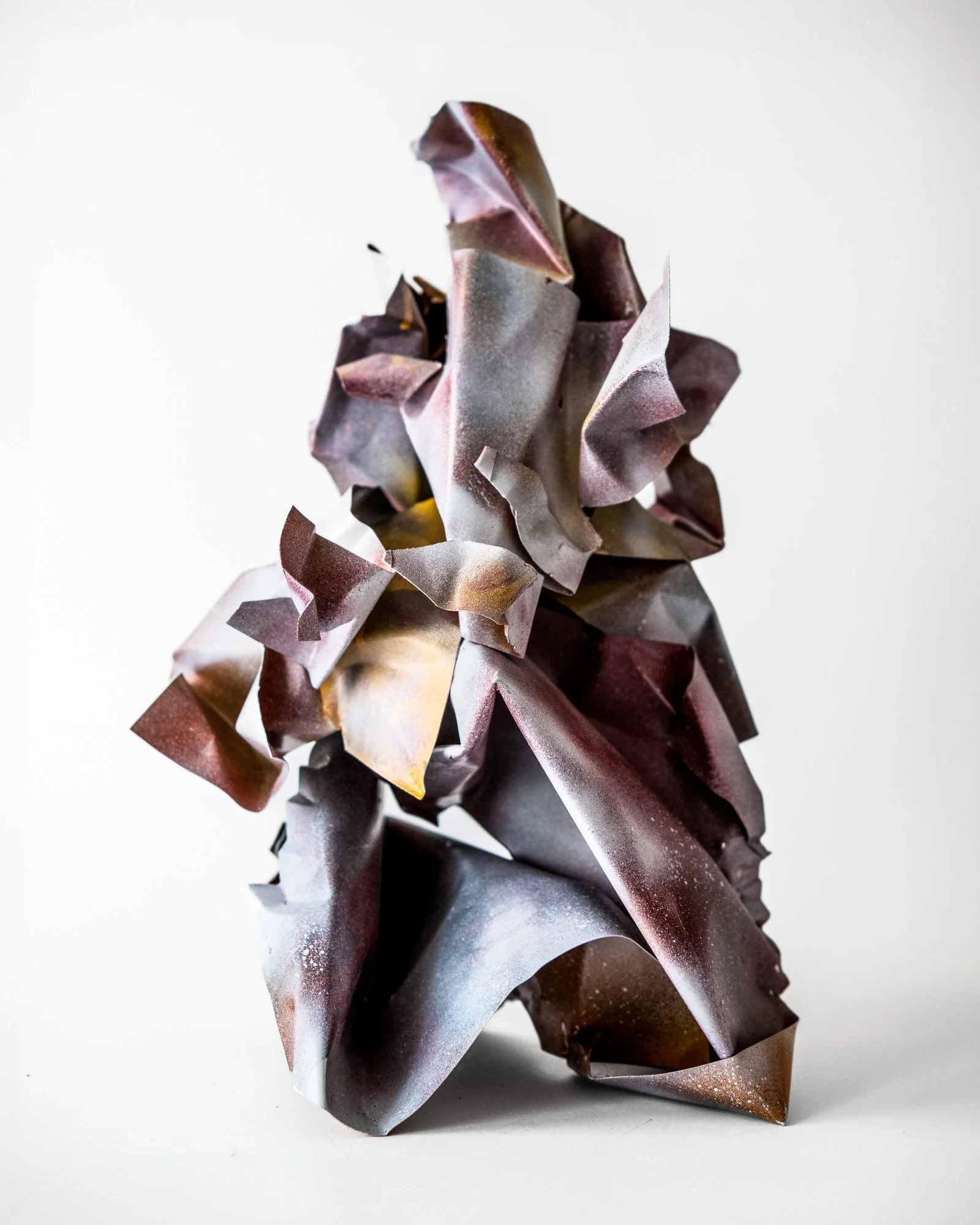 Abstract folded and crushed aluminum sculpture by Donnelly Marks