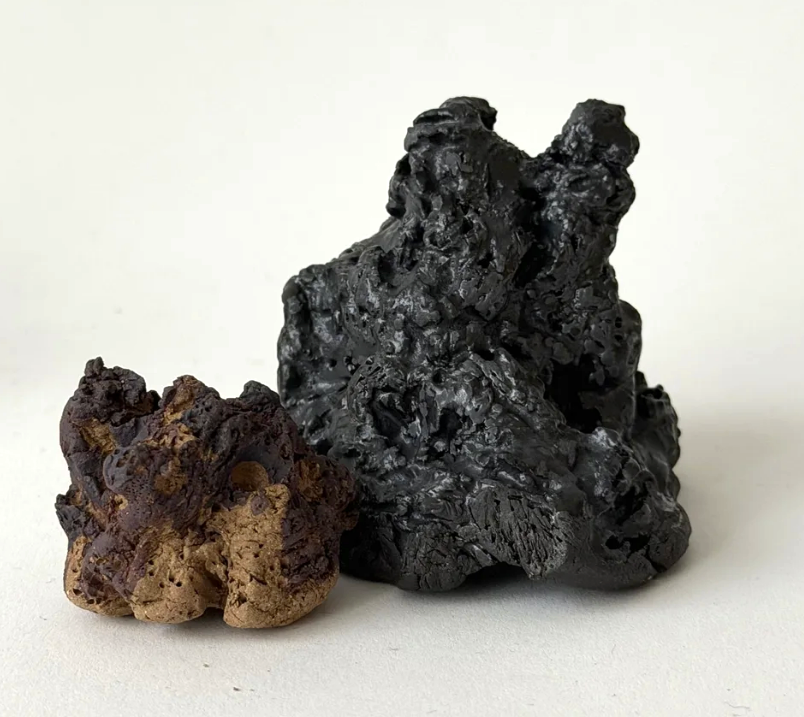Textured stoneware sculpture by Donnelly Marks, with rough, irregular surfaces inspired by natural stone.