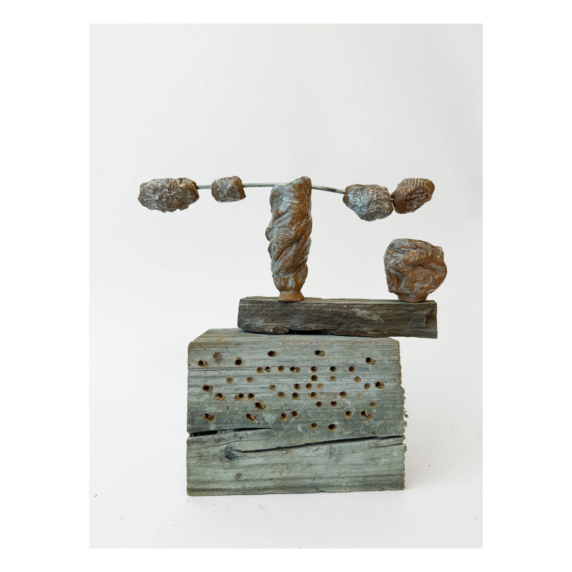 These small clay vessels and beads take on human qualities in Donnelly Markks' sculpture
