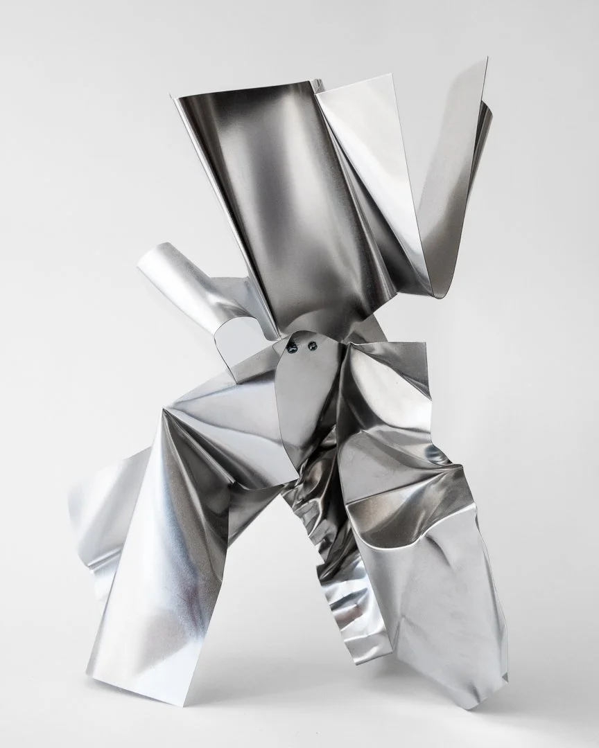 Aluminum Construction, abstract sculpture by Donnelly Marks made from folded aluminum and secured with bolts