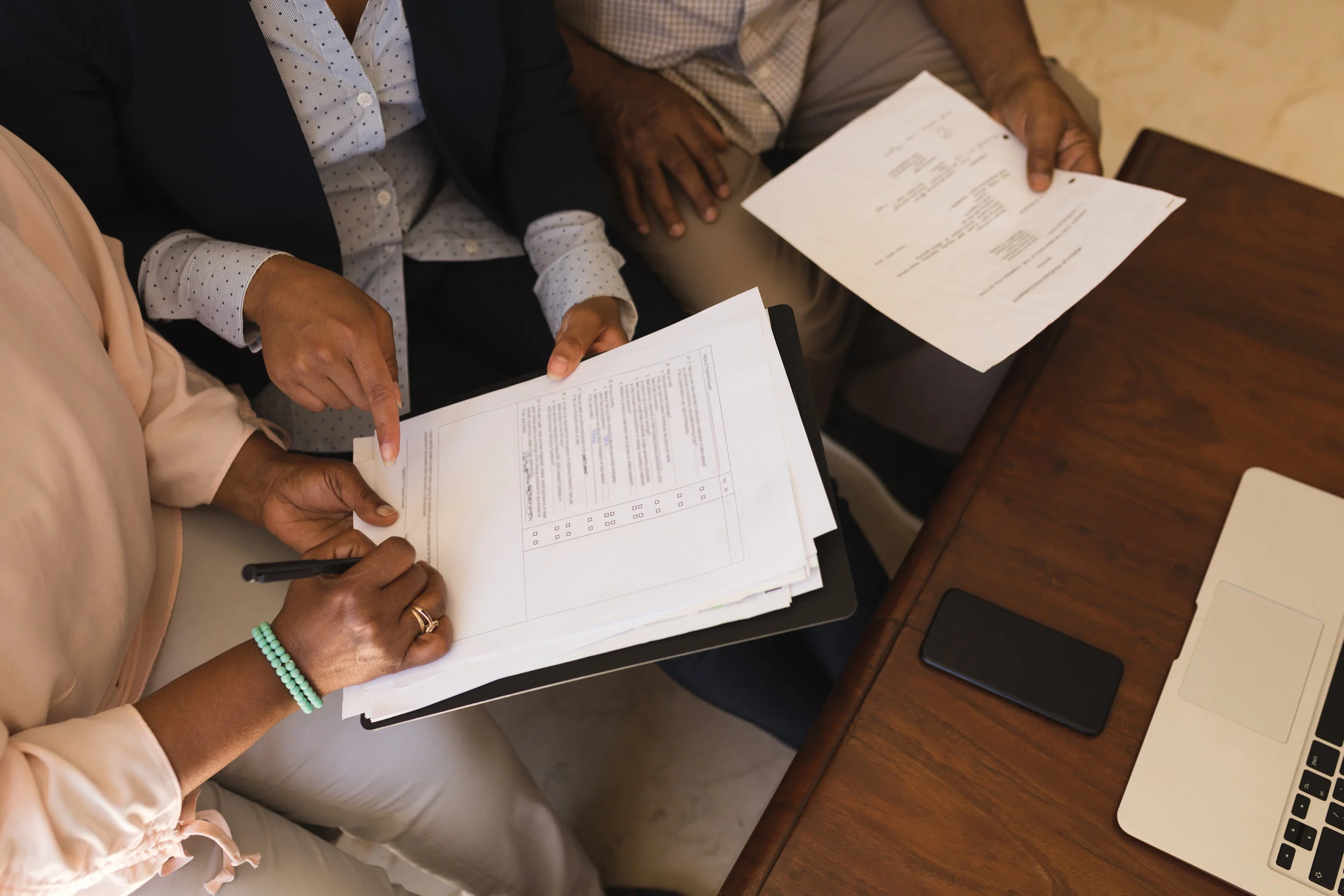 senior-woman-signing-property-contract-with-real-QG2WL5Z.jpg