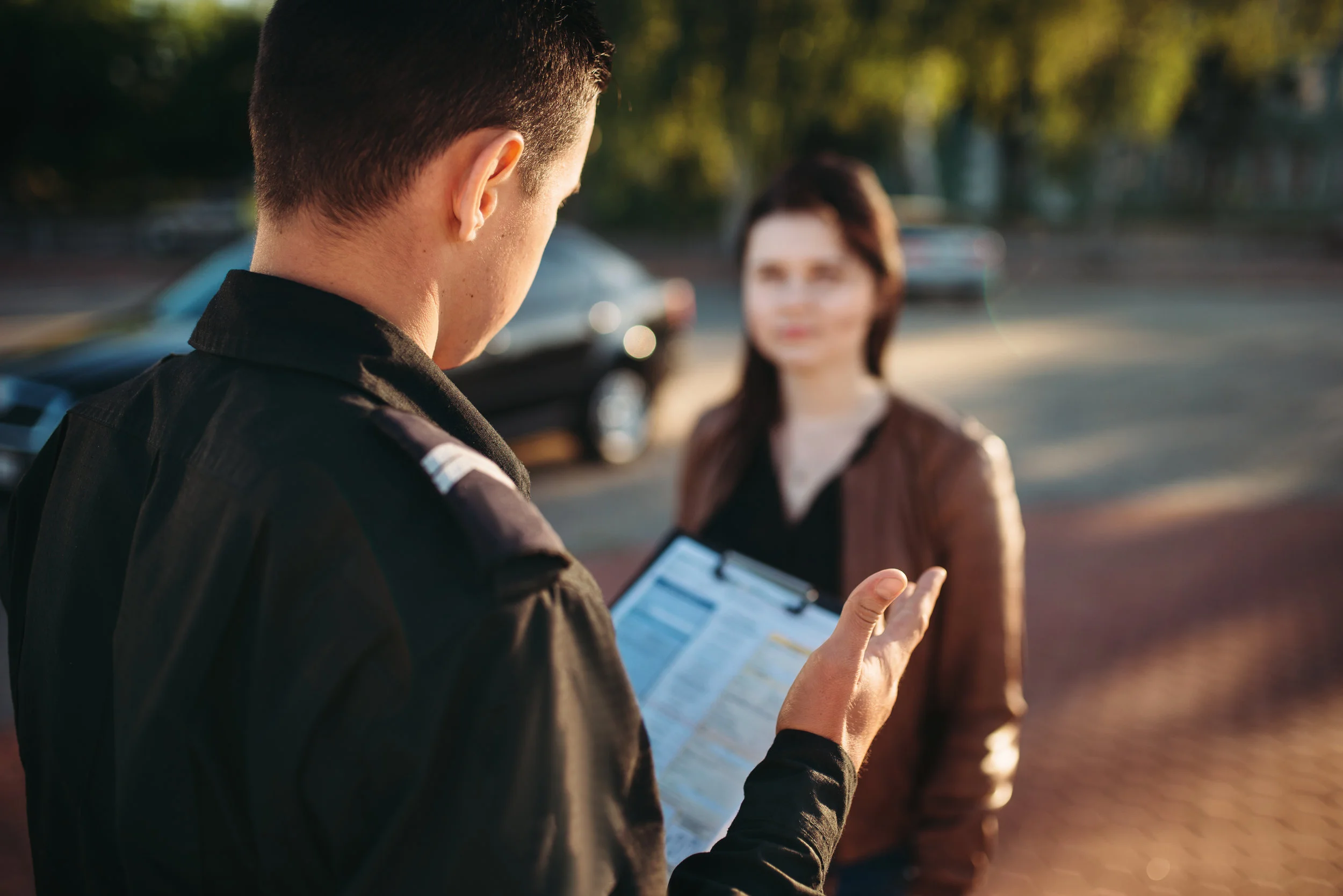 police-officers-reads-law-to-female-driver-JZKG5ML.jpg