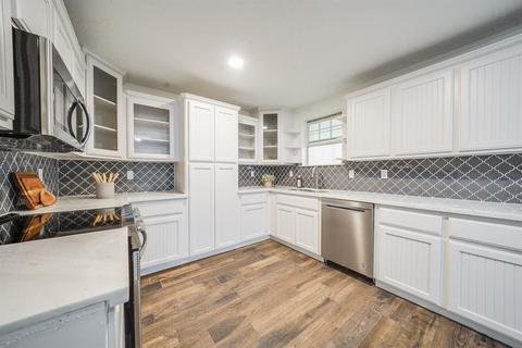 kitchen cabinets and backsplash.jpg