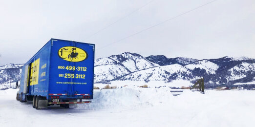 long distance moving truck in snow