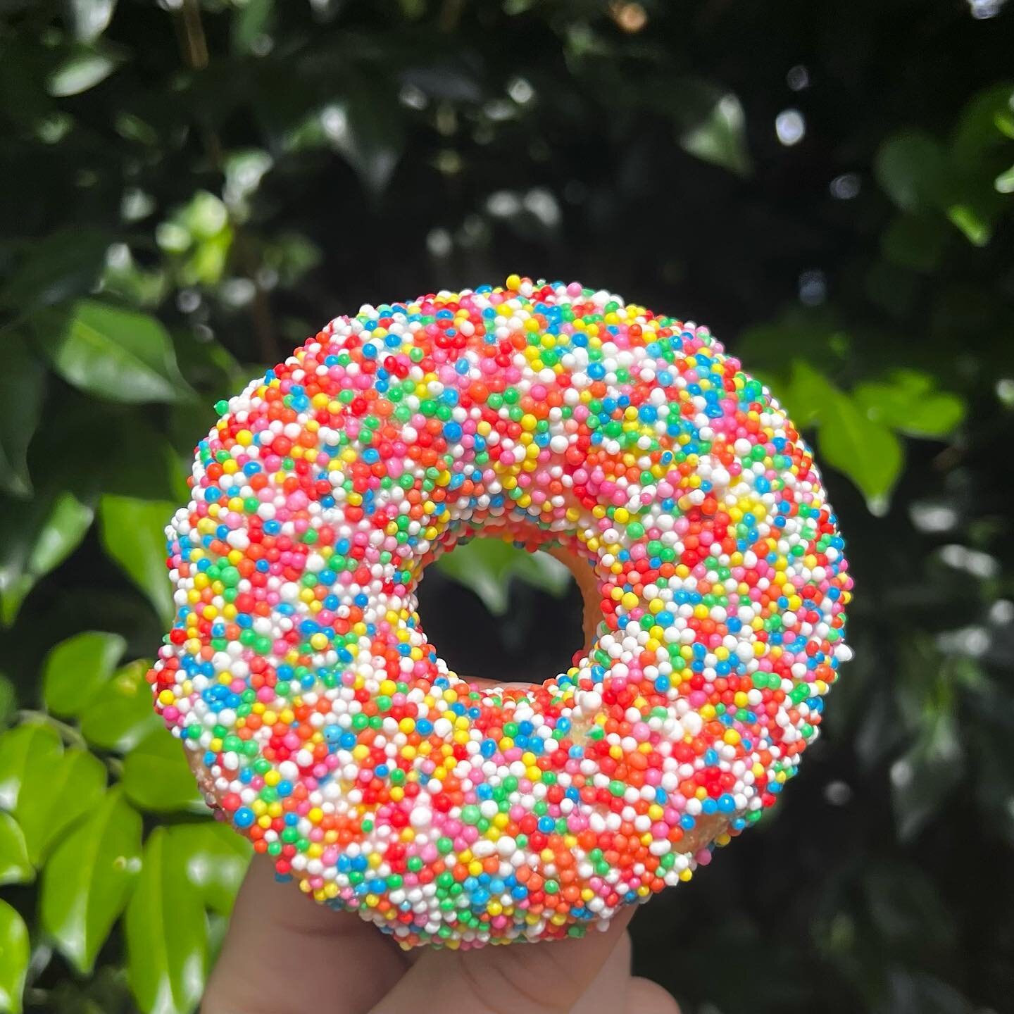 Grab a cheeky sprinkle donut to brighten up your day! ☔️🌈😁🍩