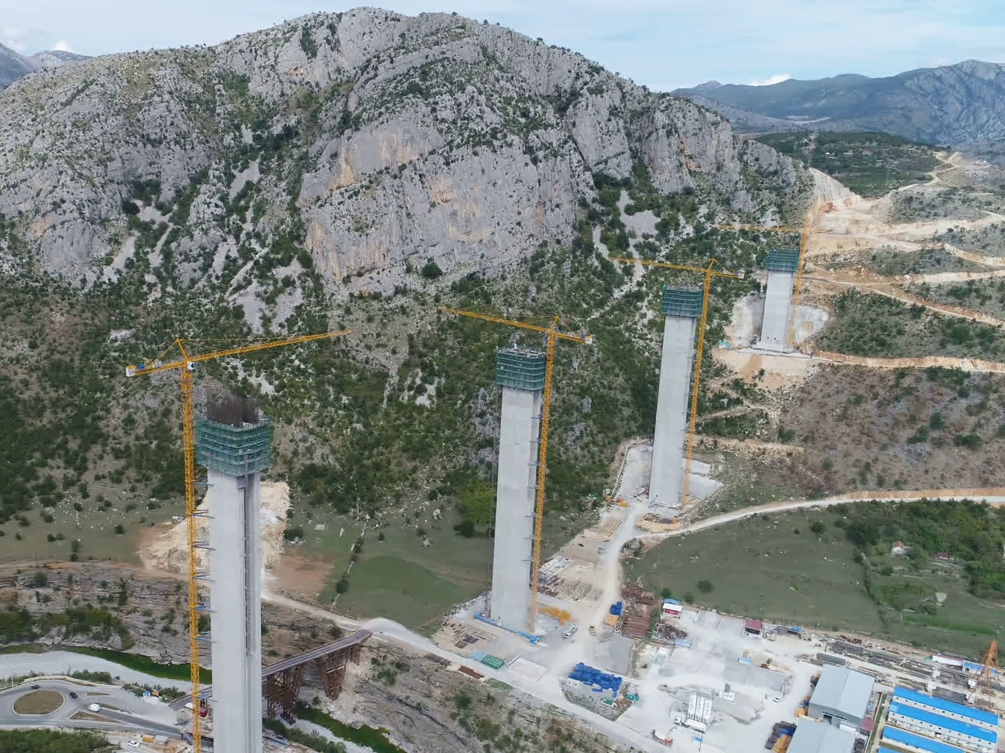 videoblocks-aerial-view-of-construction-site-of-new-bridge-and-highway-in-mountain-valley-in-montenegro-built-by-chinese-state-owned-company-one-belt-one-road-initiative-politics-and-infrastructure-europe_hnmp_ez2f_thumbnail-full01.jpg