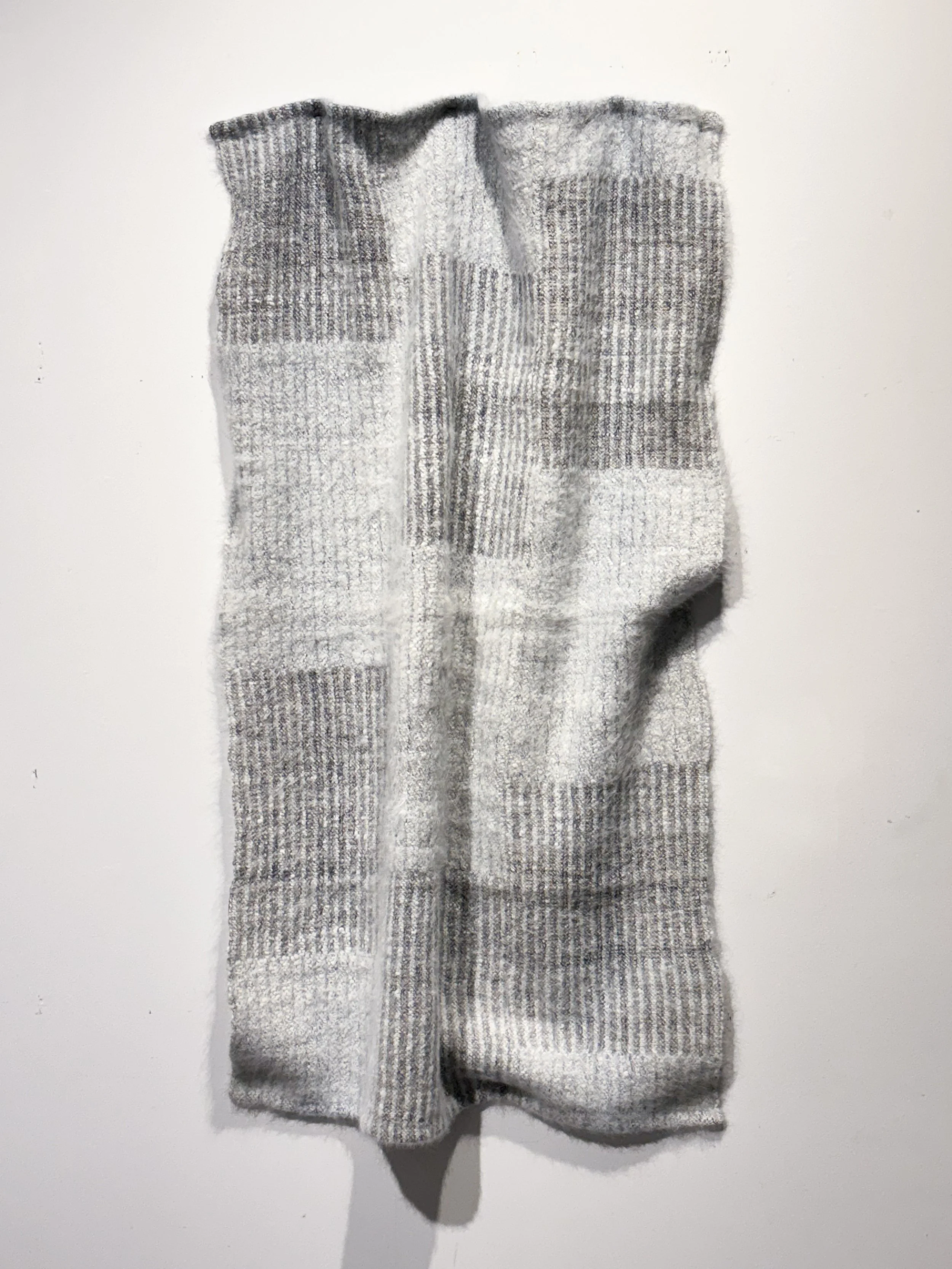 "Maja Blanka" (2022). Linen and hand-spun dog hair (Samoyed). 39” x 25” x 2”