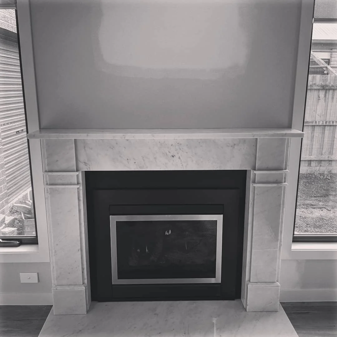 Custom made to measure White Carrara marble surround with matching hearth. Made to fit a Illusion has fire. #fireplacedecor #fireplace #marble #interiordesign #architecture #building