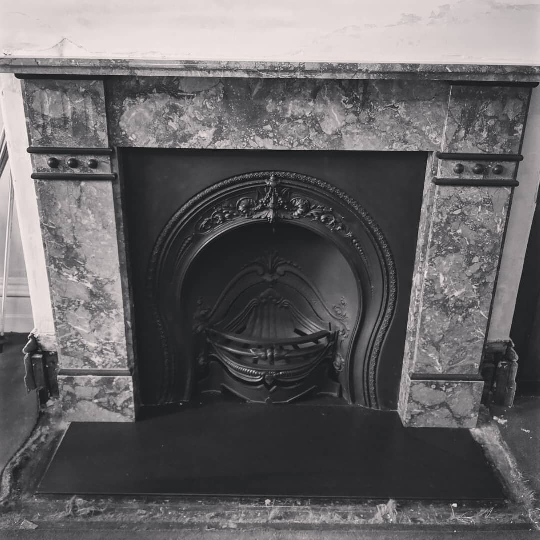 Reclaimed Victorian fireplace restoration in Hawthorn. Belgium Rouge marble surround with a Victorian horseshoe cast iron insert. Thanks to @aocstone for the hearth and installation. #fireplacedecor #fireplace #renovation #building #interiordesign