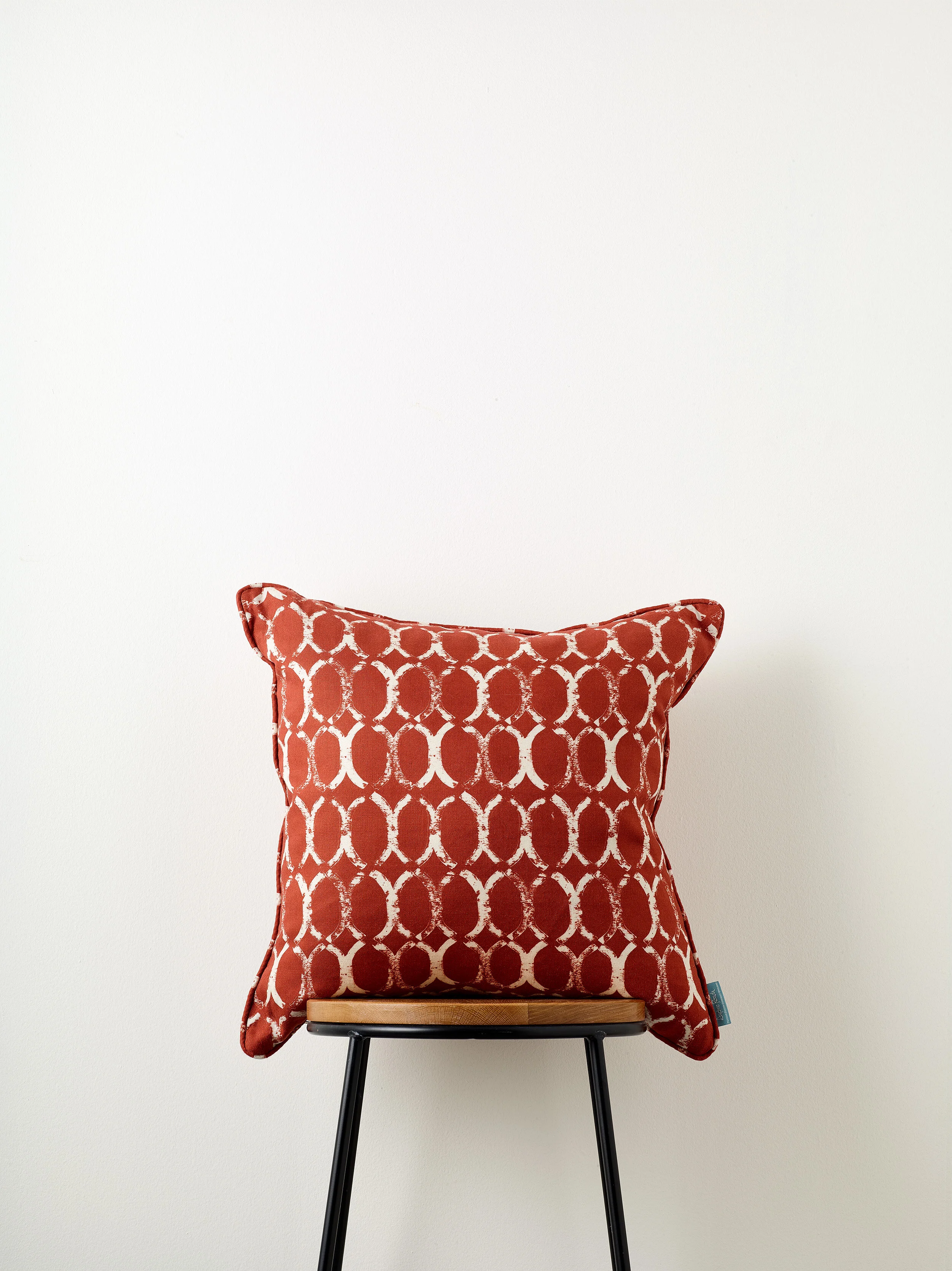 Cushion in Curved Metal Rust