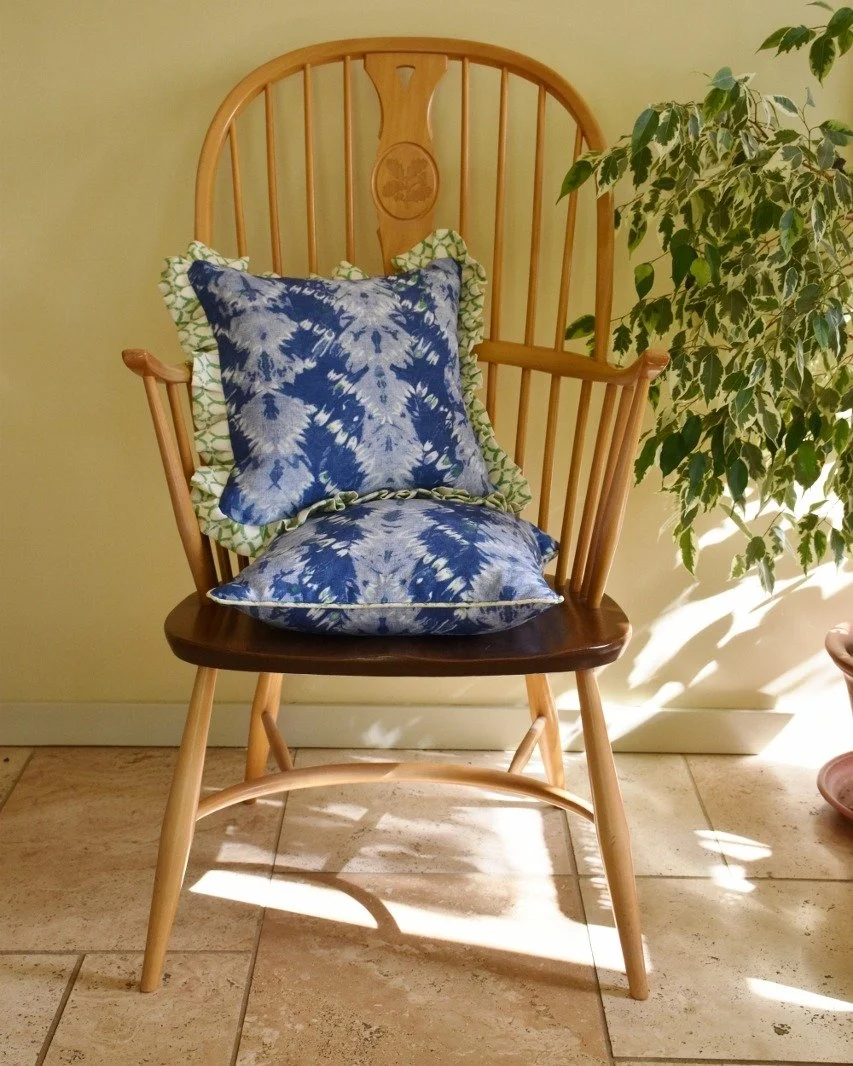 Cushions made from our new Chester Stripe fabric which, is launching on 6th October. This design is based on one of my hand-dyed Shibori pieces which has been scanned and turned into a repeat design suitable for interiors.
The green in the design has
