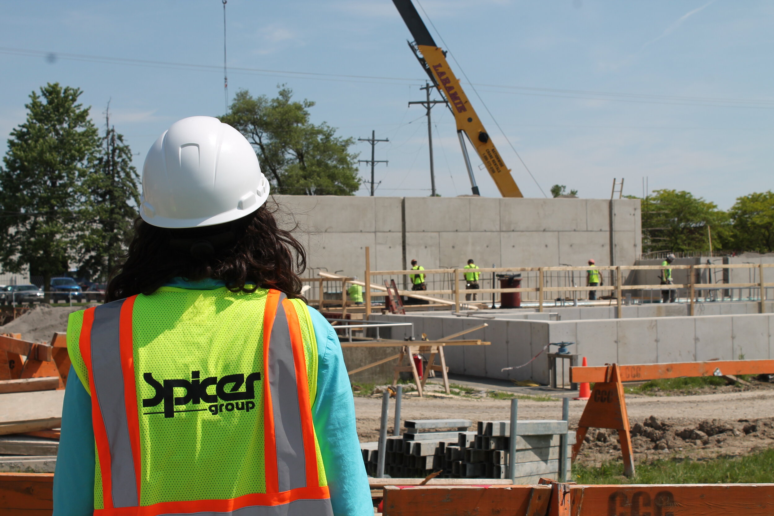  Engineer Tracy Anderson, P.E., at the Bedford Wastewater Treatment Plant project site during construction.  