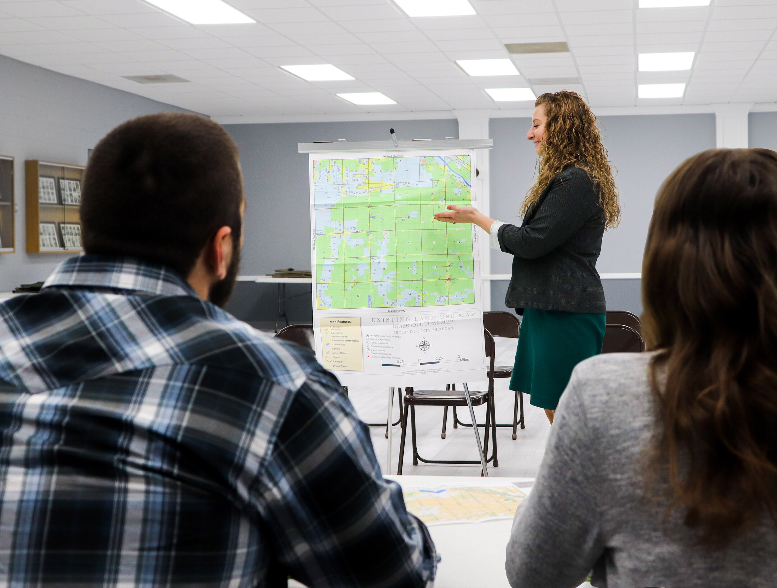  Community Planner, Jennifer Stewart, AICP, during a client presentation.  