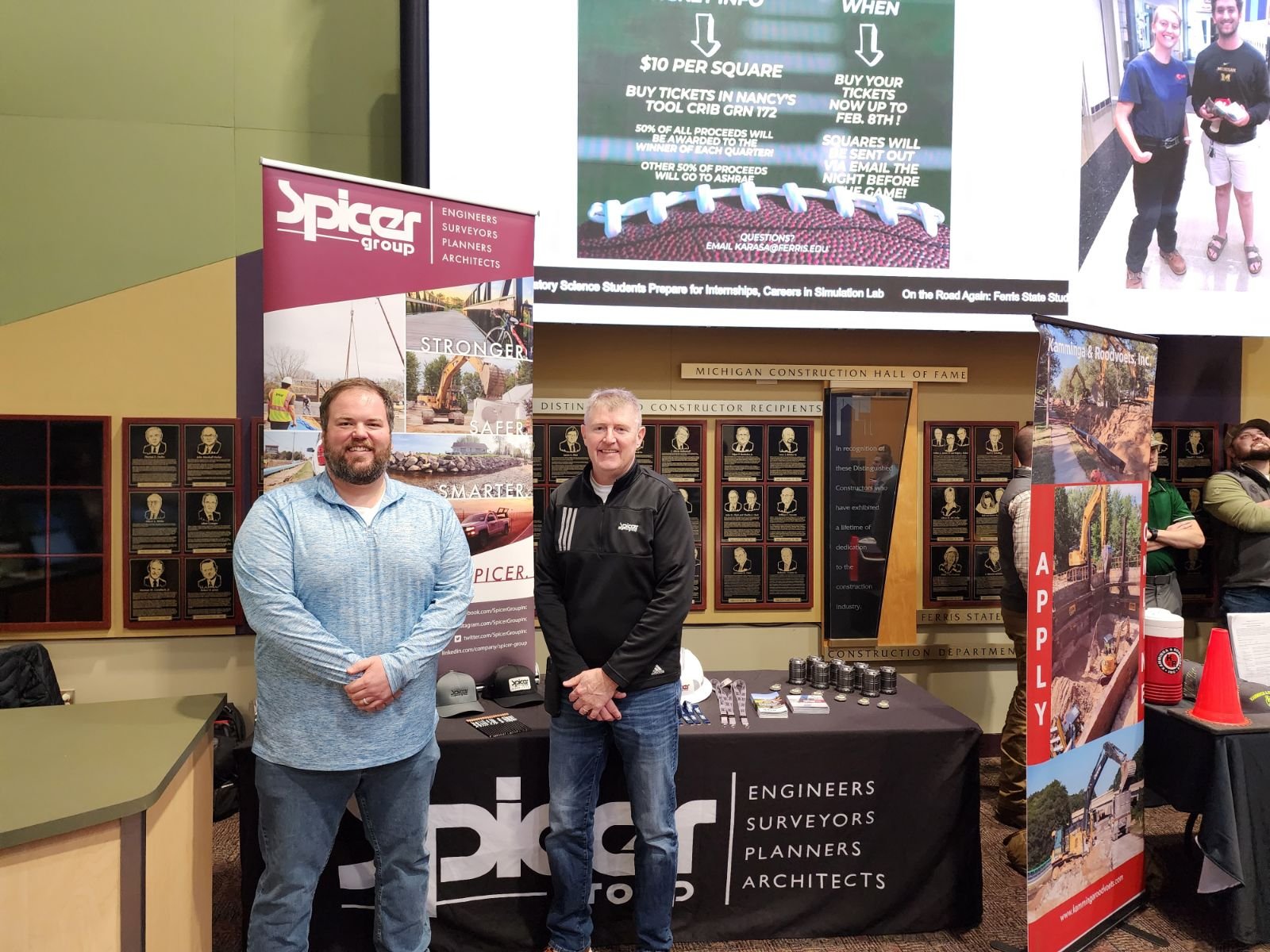  Construction Service Group Manager, Nate Pfennginer, P.E., and Senior Manager, Rick Born, at a job fair. 