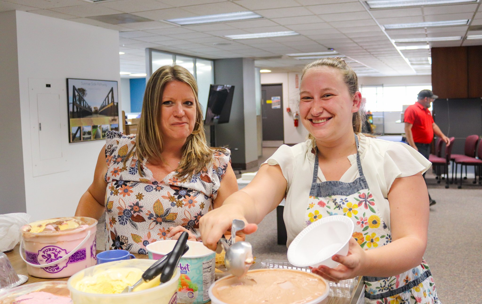  HR Benefits Manager, Jenny Taylor-Chaltraw, and Senior Human Resources Generalist, Sarah Furstenberg, scooping ice cream for our employee appreciation week. 
