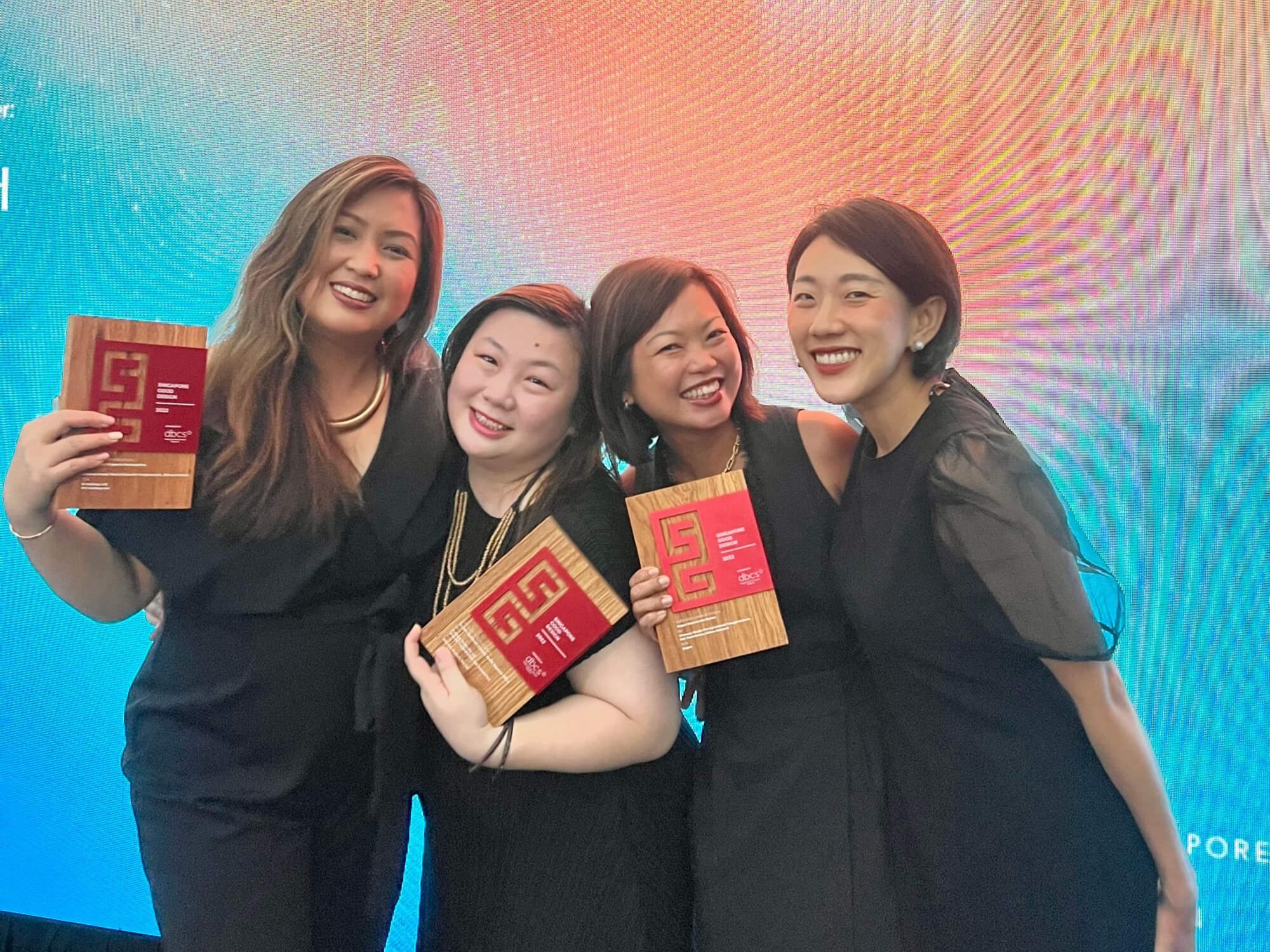  The ladies of Conexus strike a pose with the SG Mark plaques: (L to R) Senior Interior Designer Althea Almazar, Senior Quantity Surveyor Jodie Lim, Associate Director, Marketing &amp; Communications Lim Sio Hui, Associate Design Director Nat Jentrai