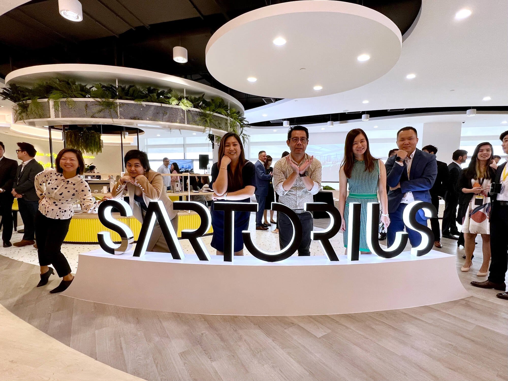  Spot the difference? Posing with the Sartorius signage, post-construction. 