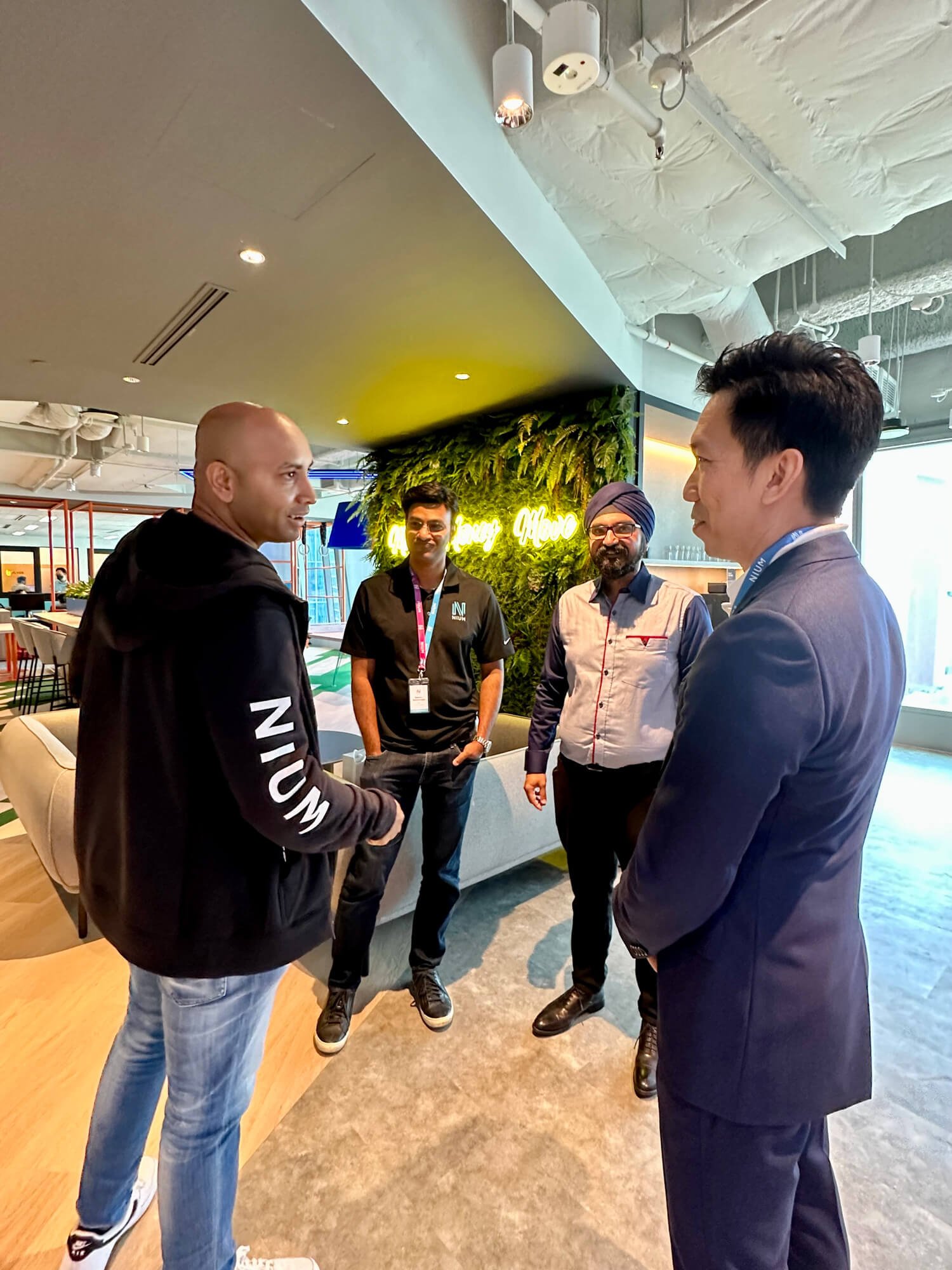  Nium CEO Prajit Nanu and Conexus Managing Director Brendan Khor exchange greetings on opening day 