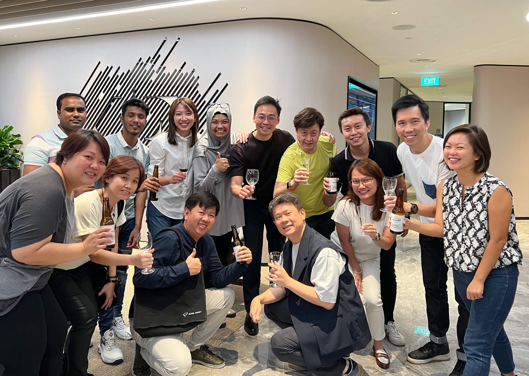  The Conexus Studio and Korn Ferry teams toasting to the project at the Fridays at Five event 
