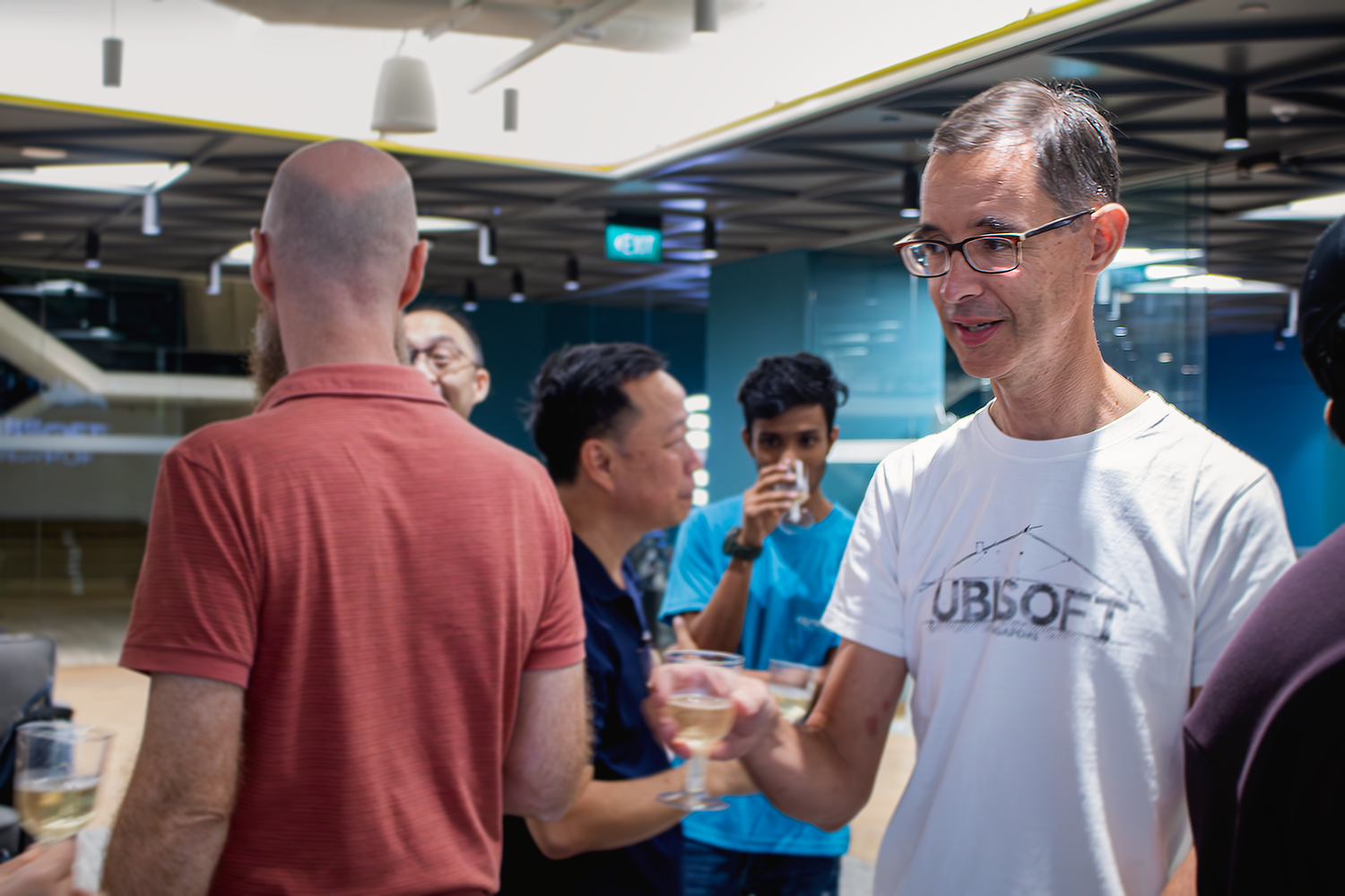  Ubisoft Singapore's Studio Operations Director, Antoine Leroy sharing a toast with the Conexus team. 