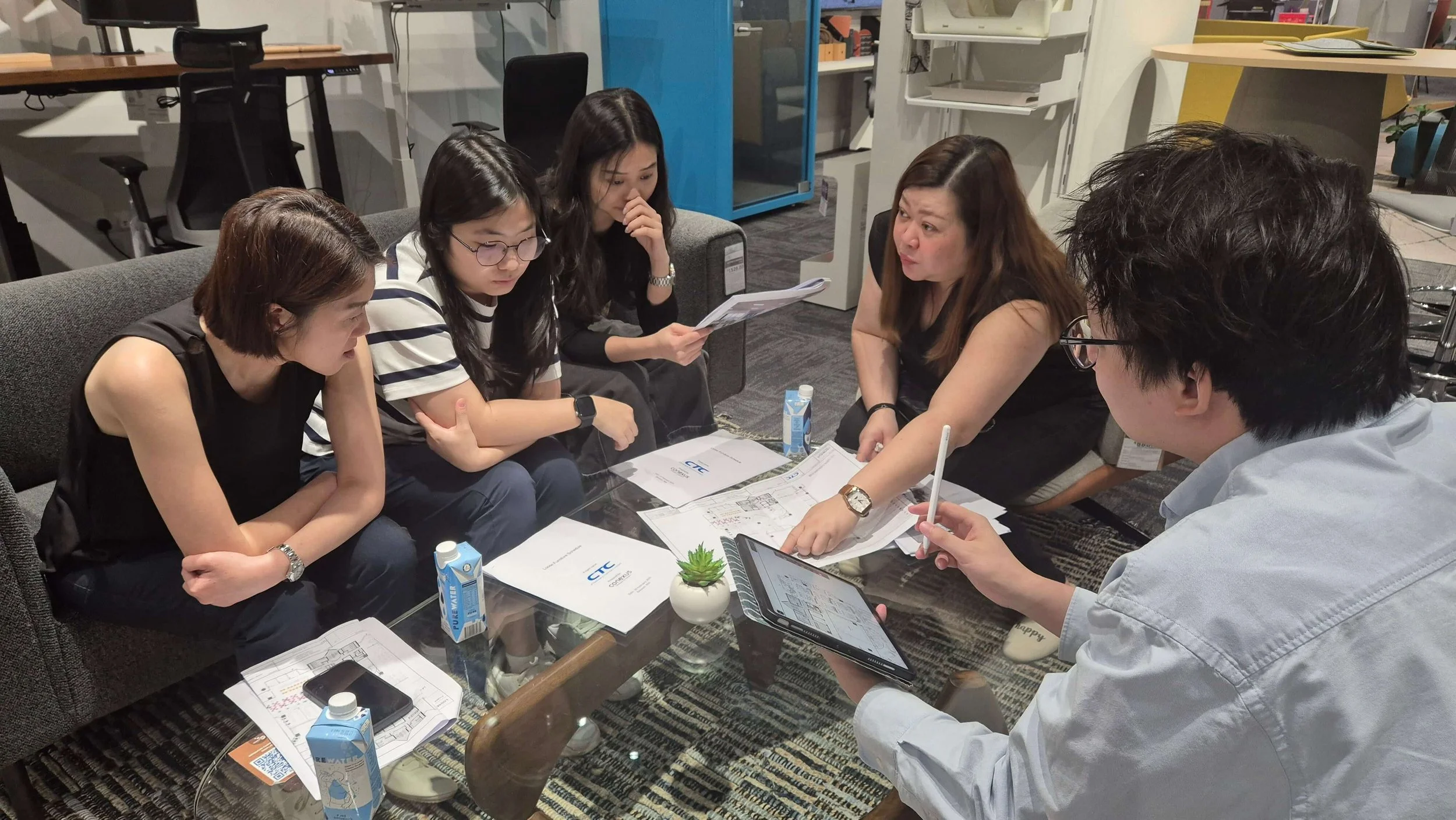 Reviewing plans and exploring options—furniture sourcing to ensure every detail reflects the vision for their new space.