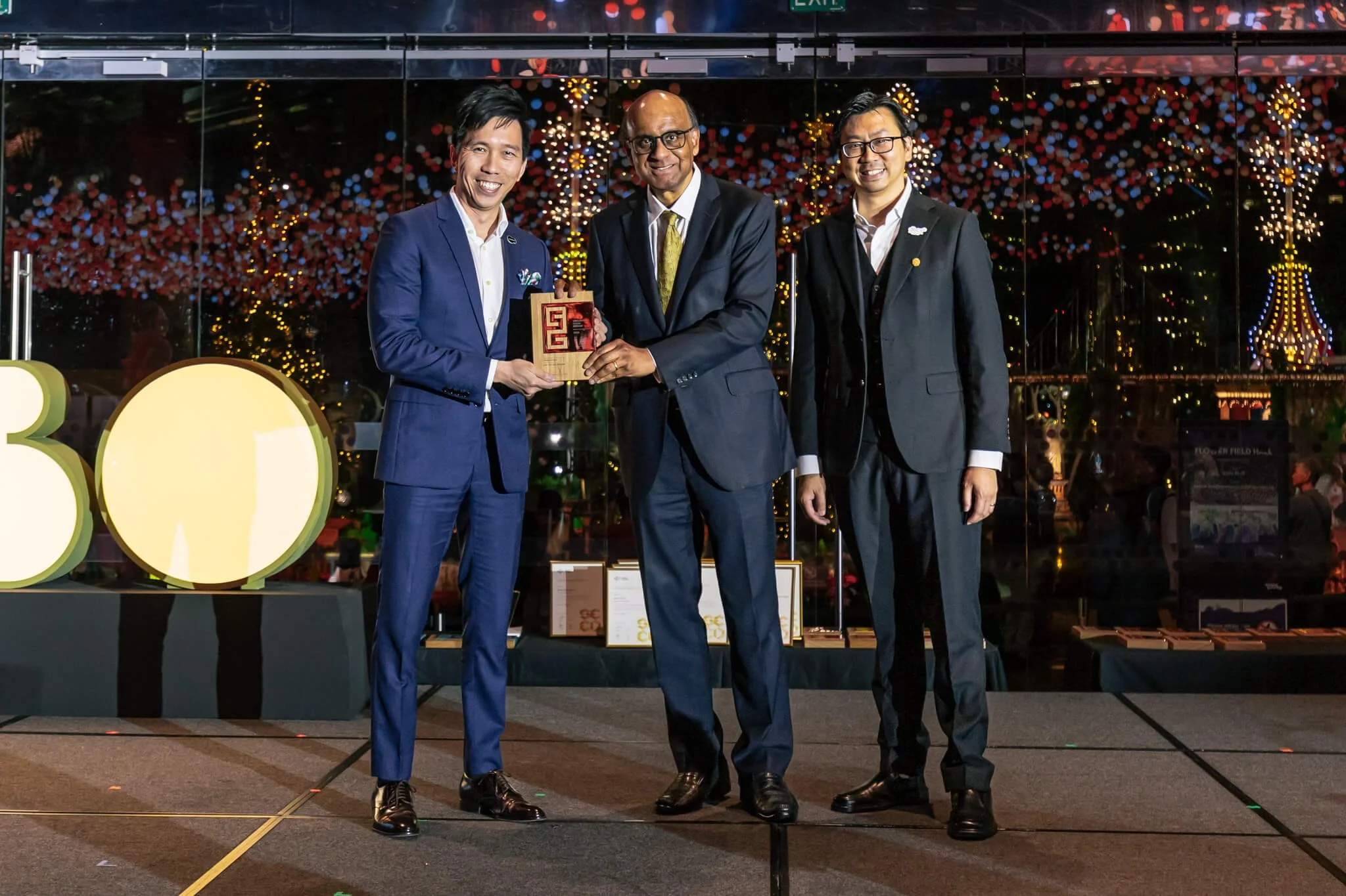  Managing Director Brendan Khor on stage to receive the SG Mark Remarkable Award from President Tharman at the DBCS 40th Anniversary Dinner 