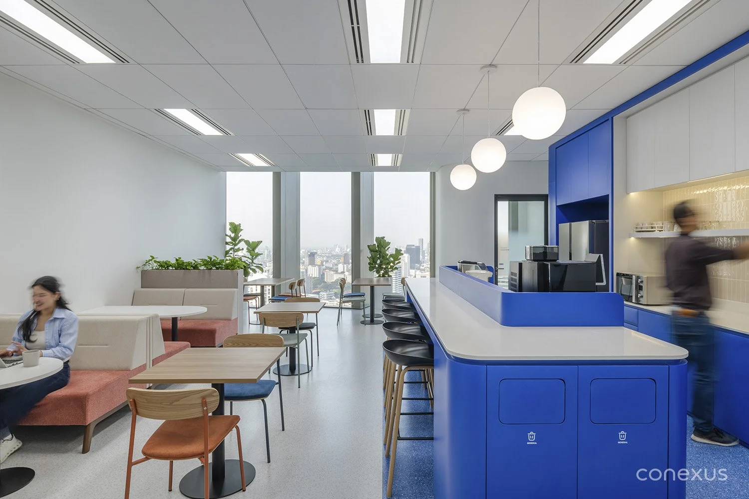  A café-style pantry anchors the space with warmth, openness and city views. 