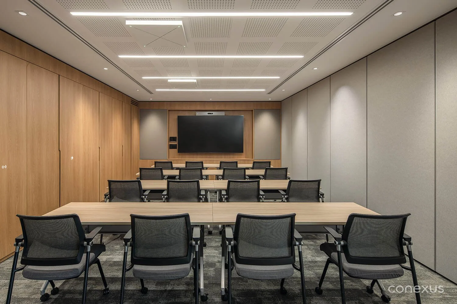  Dual-purpose training rooms reconfigure to match the task — from workshops to formal presentations. 