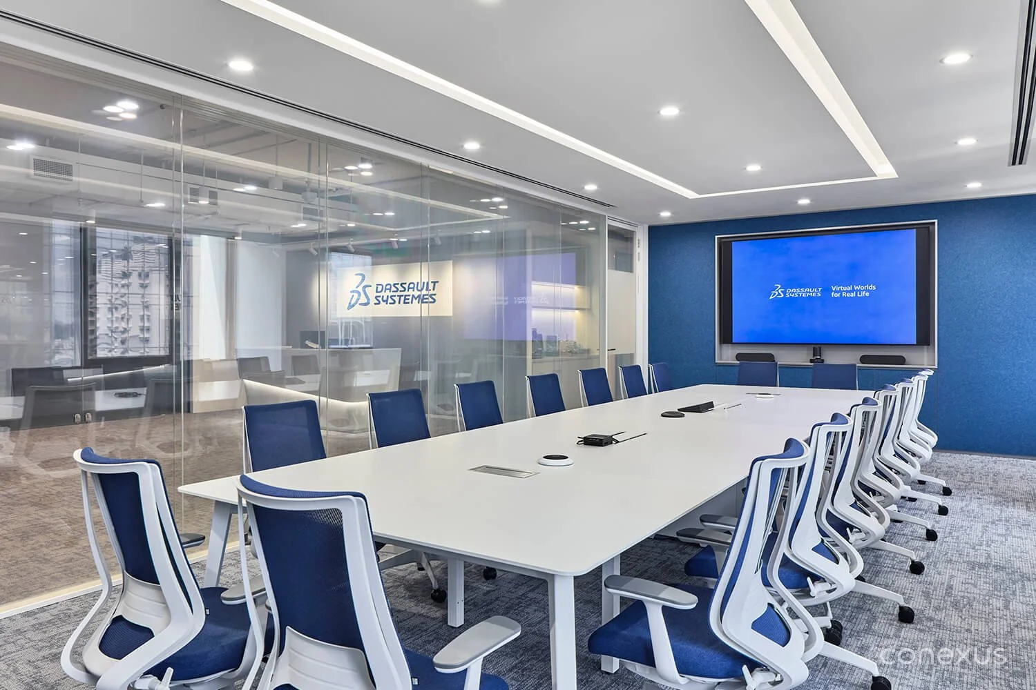  A restrained palette informs the design, allowing Dassault’s signature blue to stand out without feeling overwhelming. 